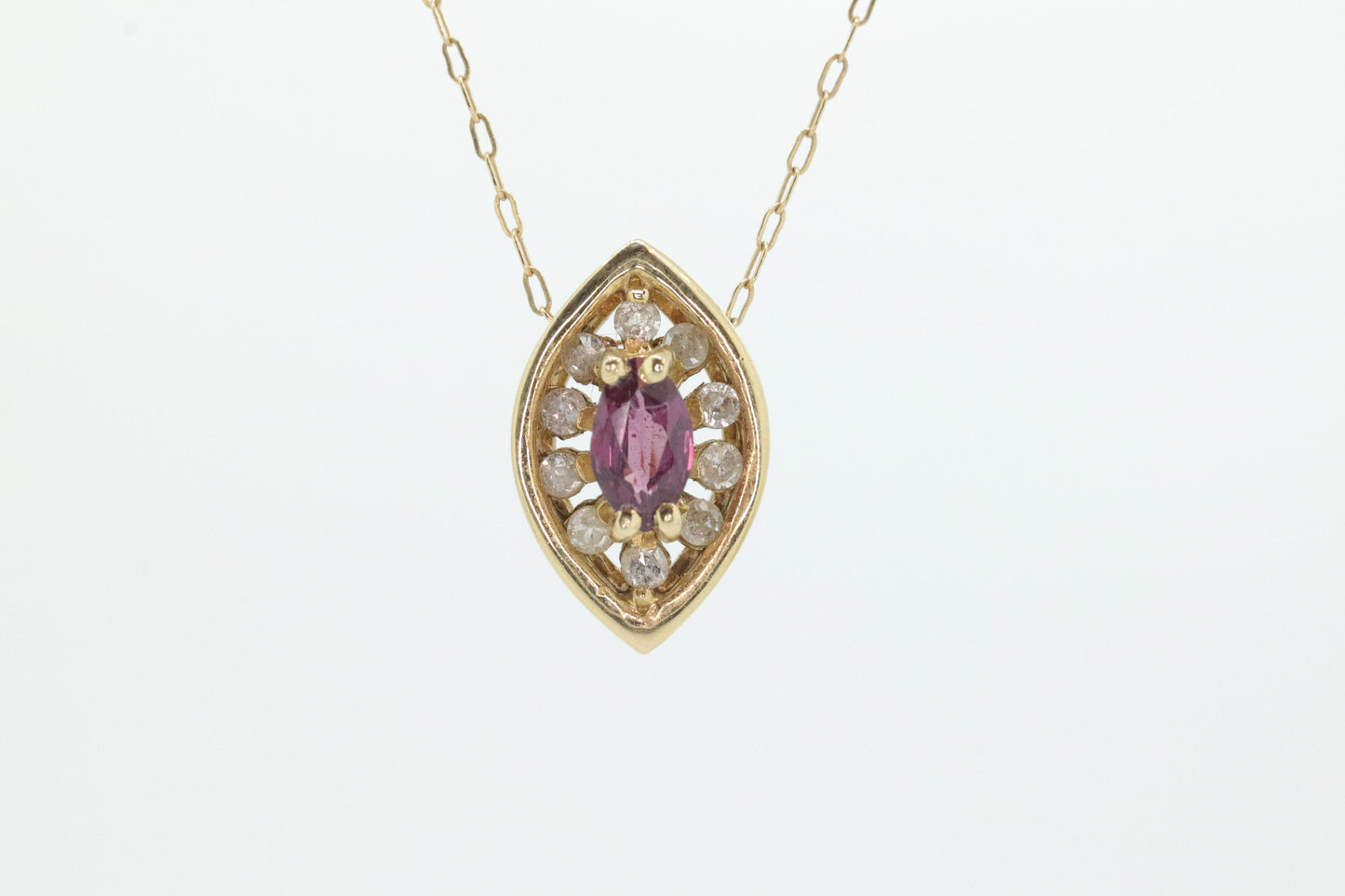 Ruby and diamond halo pendant. 14k precious marquise ruby pendant necklace. st(80/50)