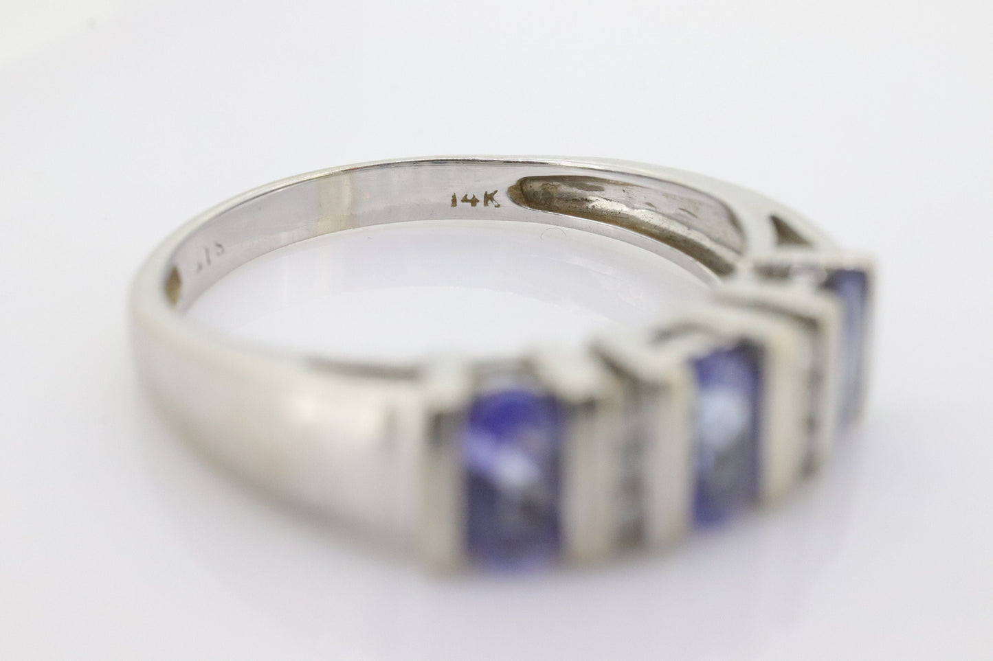14k Tanzanite Oval and Diamond Channel Anniversary ring. Channel set eternity band. Tanzanite diamond. st(98)