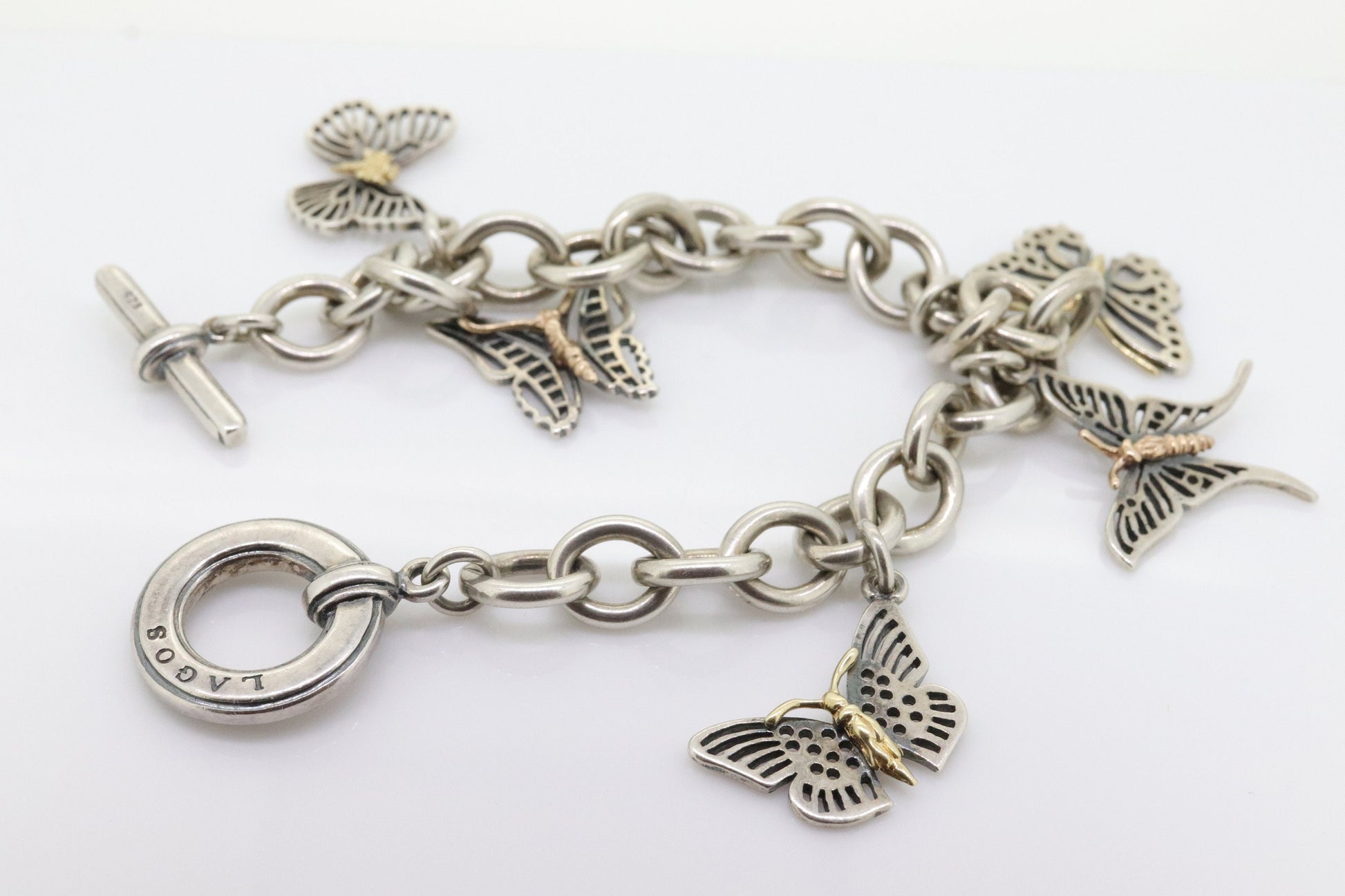LAGOS Caviar Butterfly Bracelet. Sterling Silver 18K Yellow Gold Butterfly Charm Dangling Heavy Bracelet. (st161)