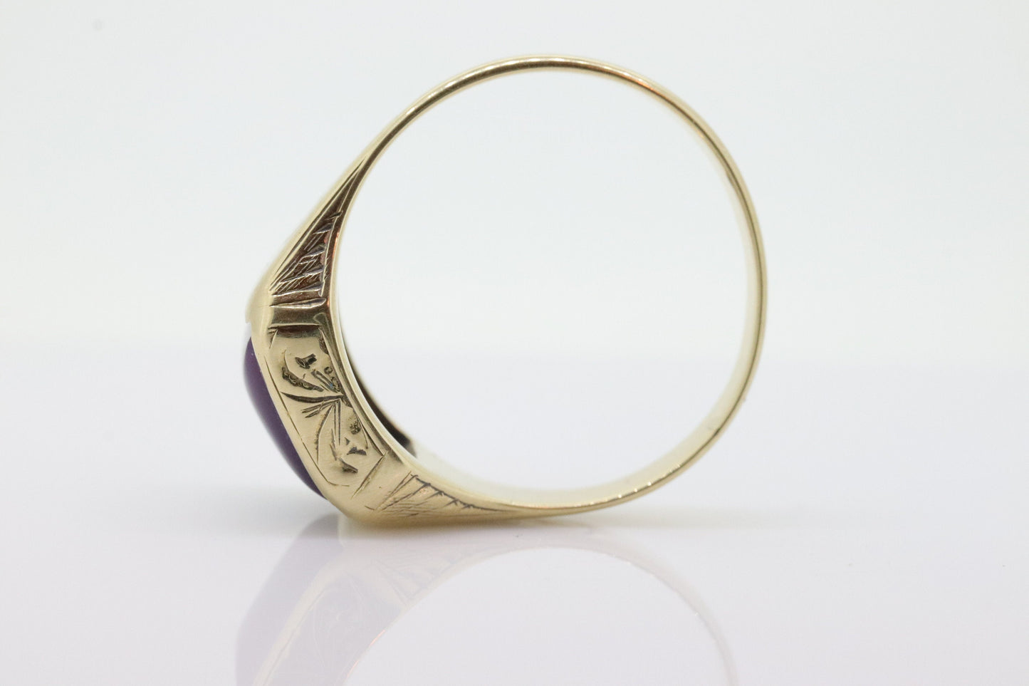 10k SUGILITE Purple bezel ring. Antique engraved 10k Rectangle Purple Sugilite bezel set in a Heavy shank. SZ 11 5.1grams