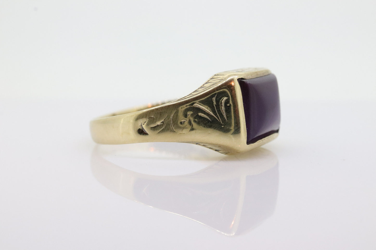 10k SUGILITE Purple bezel ring. Antique engraved 10k Rectangle Purple Sugilite bezel set in a Heavy shank. SZ 11 5.1grams