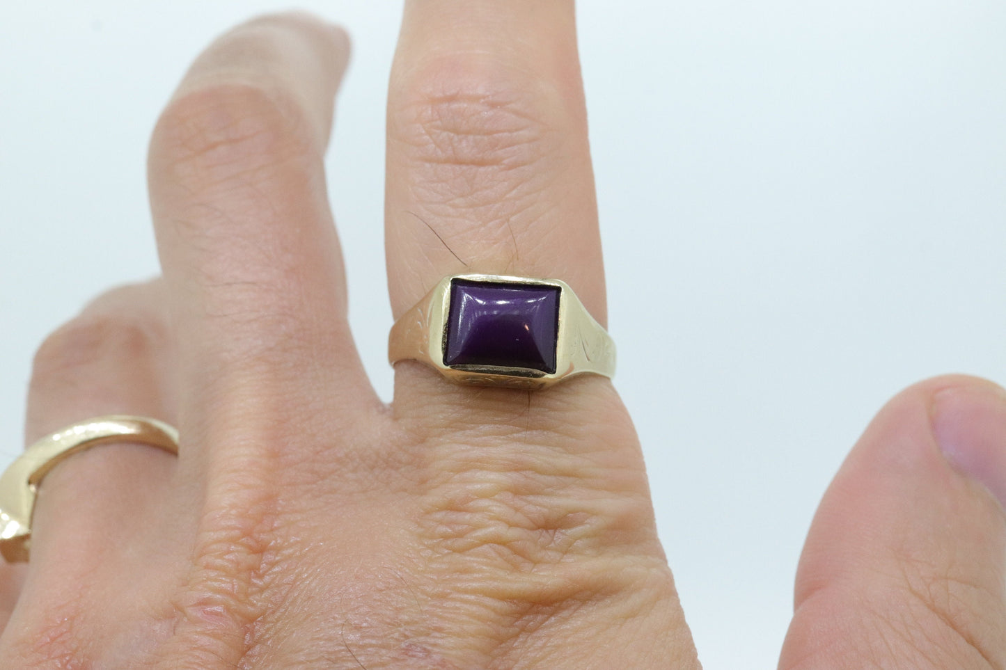 10k SUGILITE Purple bezel ring. Antique engraved 10k Rectangle Purple Sugilite bezel set in a Heavy shank. SZ 11 5.1grams
