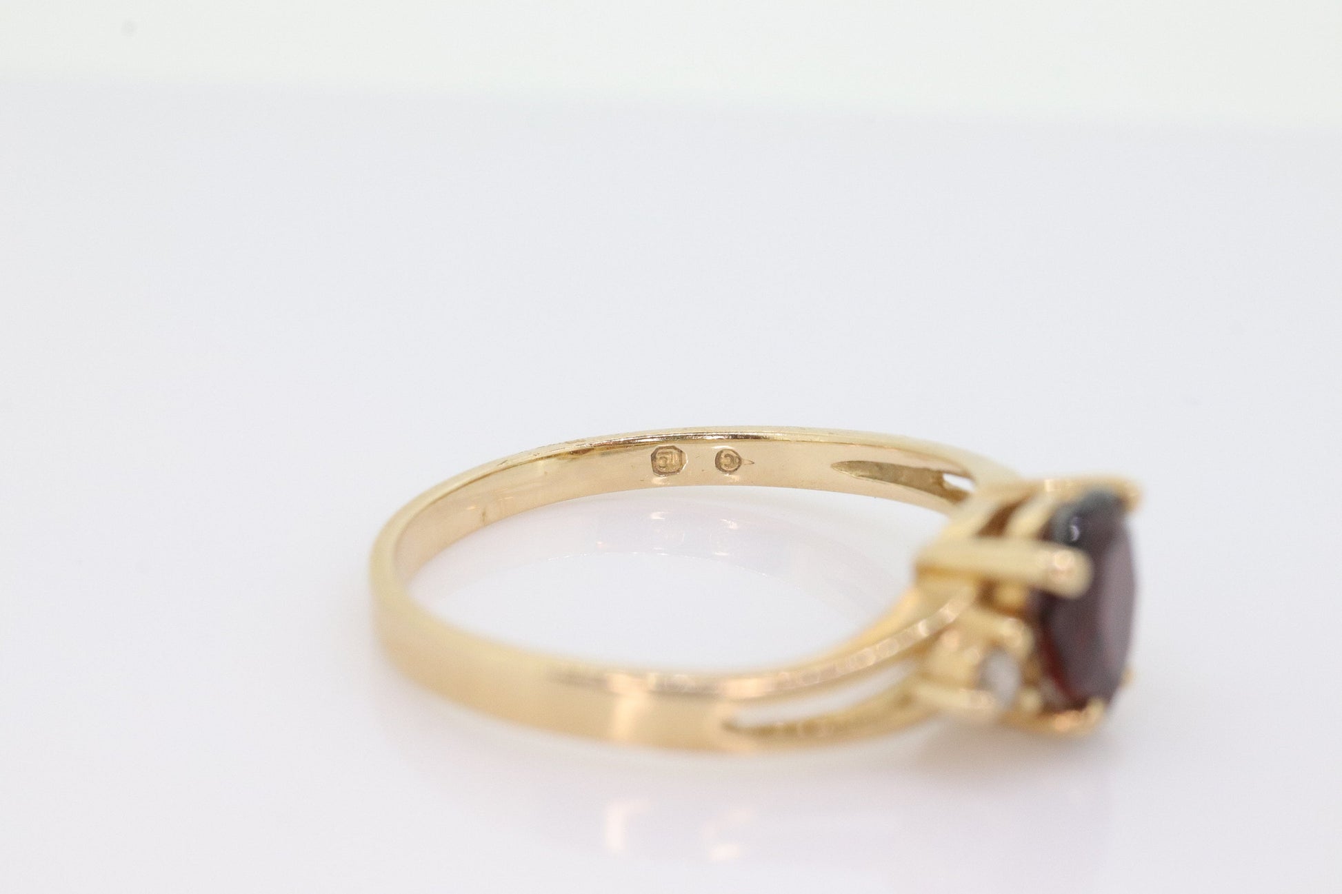 14k Pear Garnet and diamond ring. 14k Pear cut garnet with diamonds solitaire