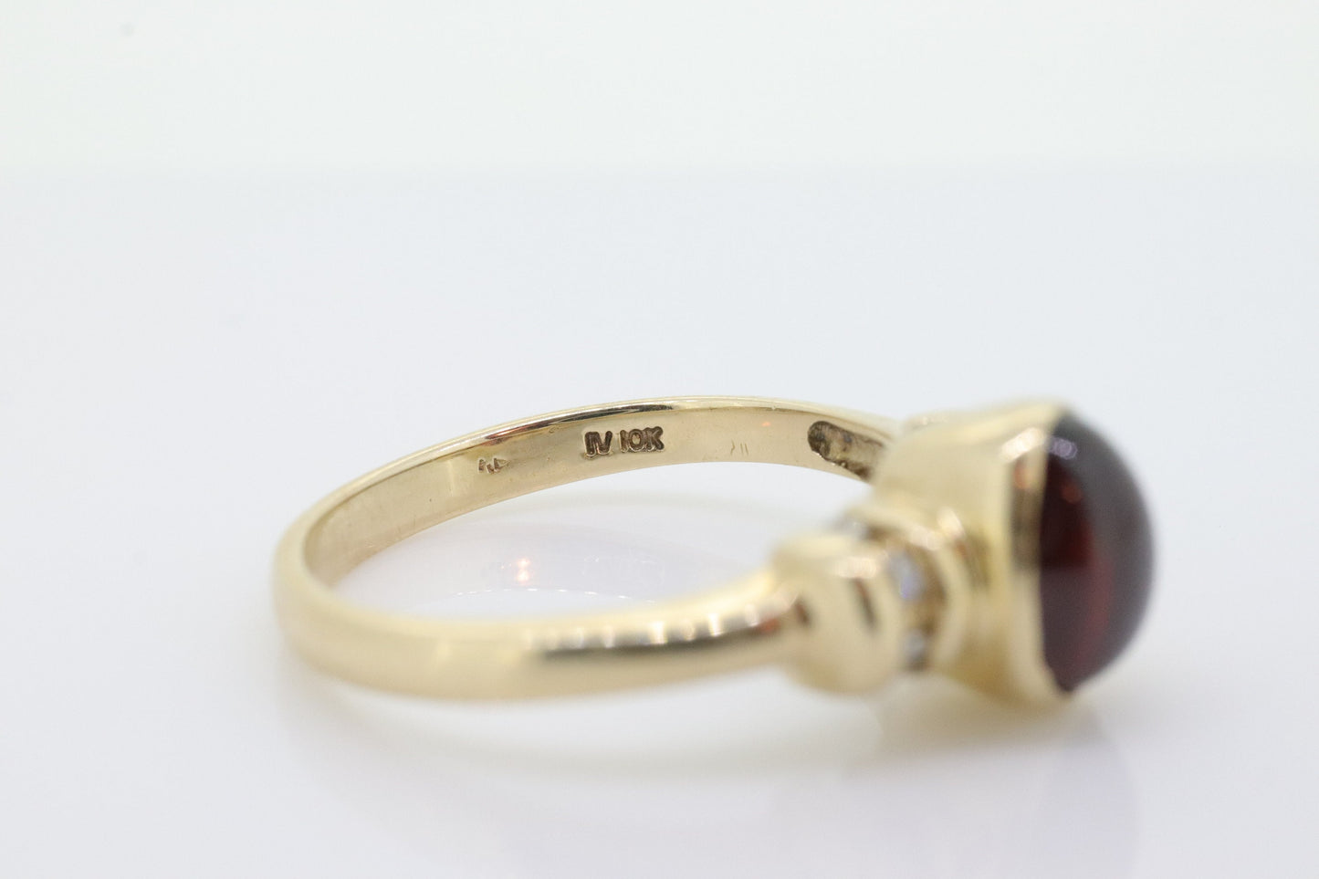 10k Red Tourmaline Ring. Bezel set OVAL Cabochon Tourmaline solitaire and diamond ring. st(92)