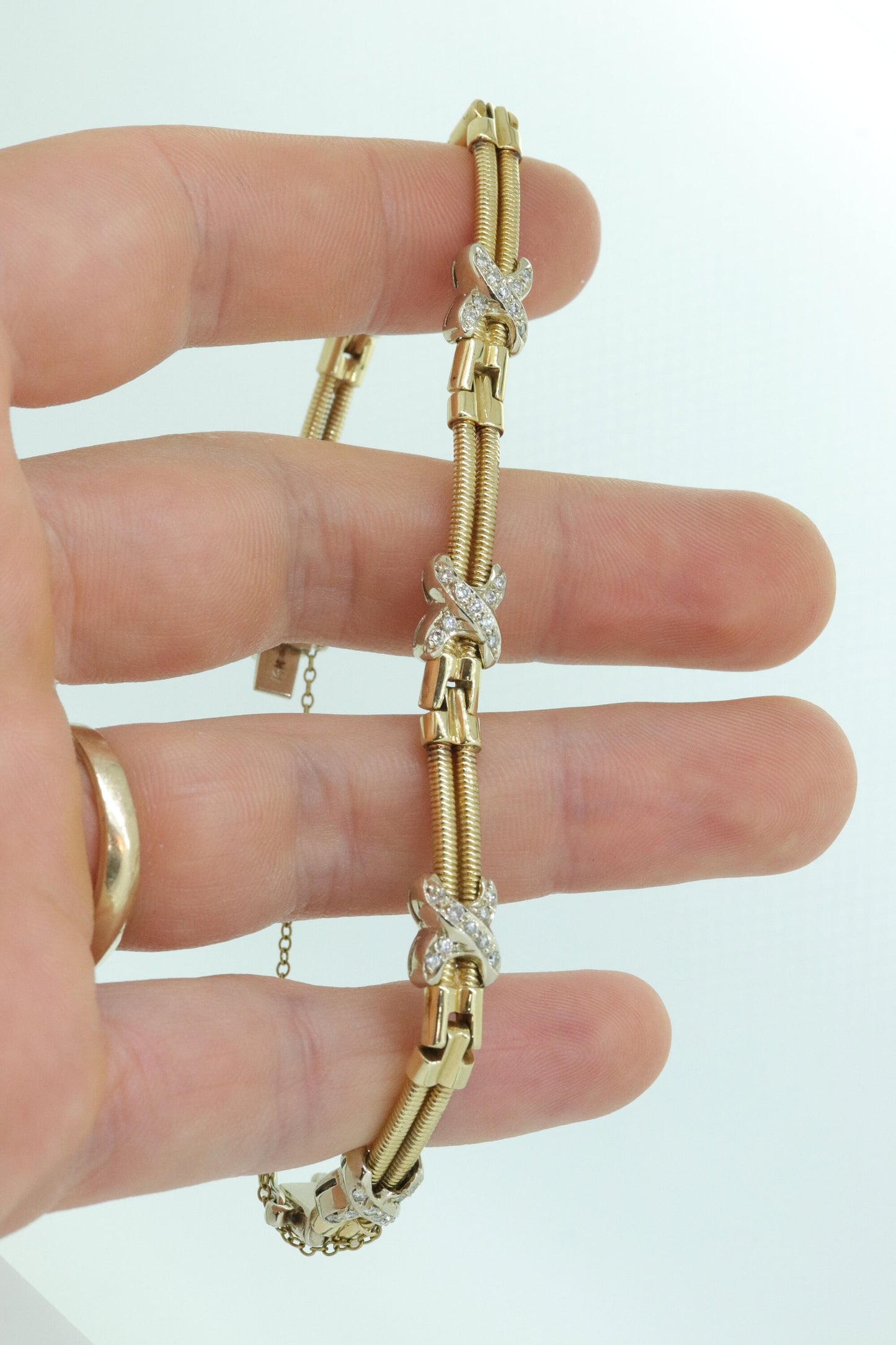 Diamond X slide Bracelet. 14k Yellow White Gold XO Diamond Slide cord Bracelet. 27.4grams Two strand station bracelet. st(302/50)