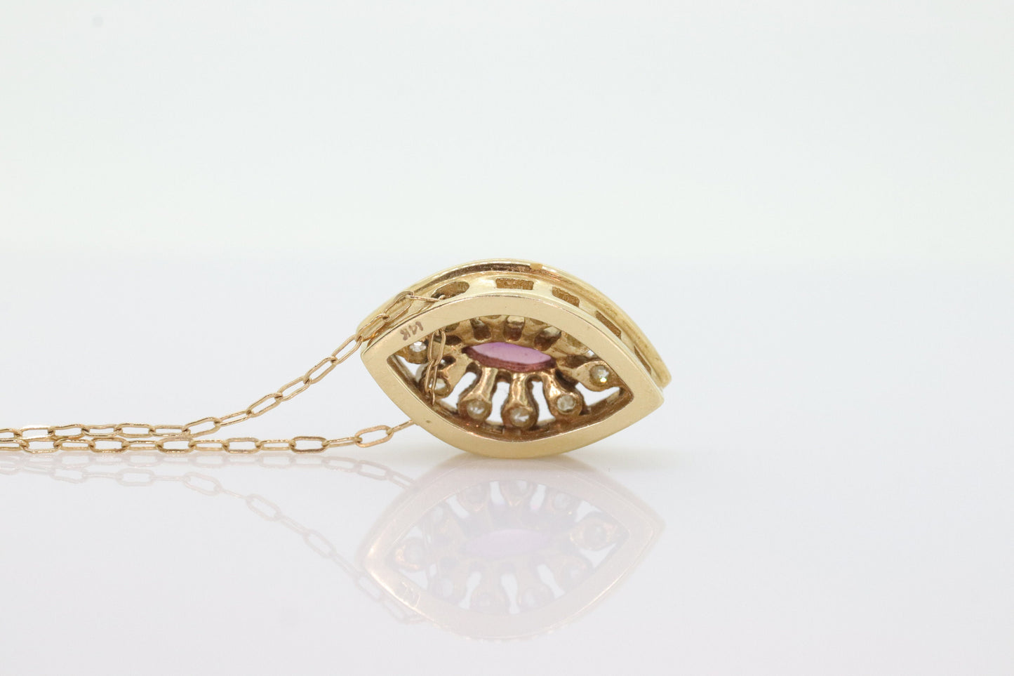 Ruby and diamond halo pendant. 14k precious marquise ruby pendant necklace. st(80/50)