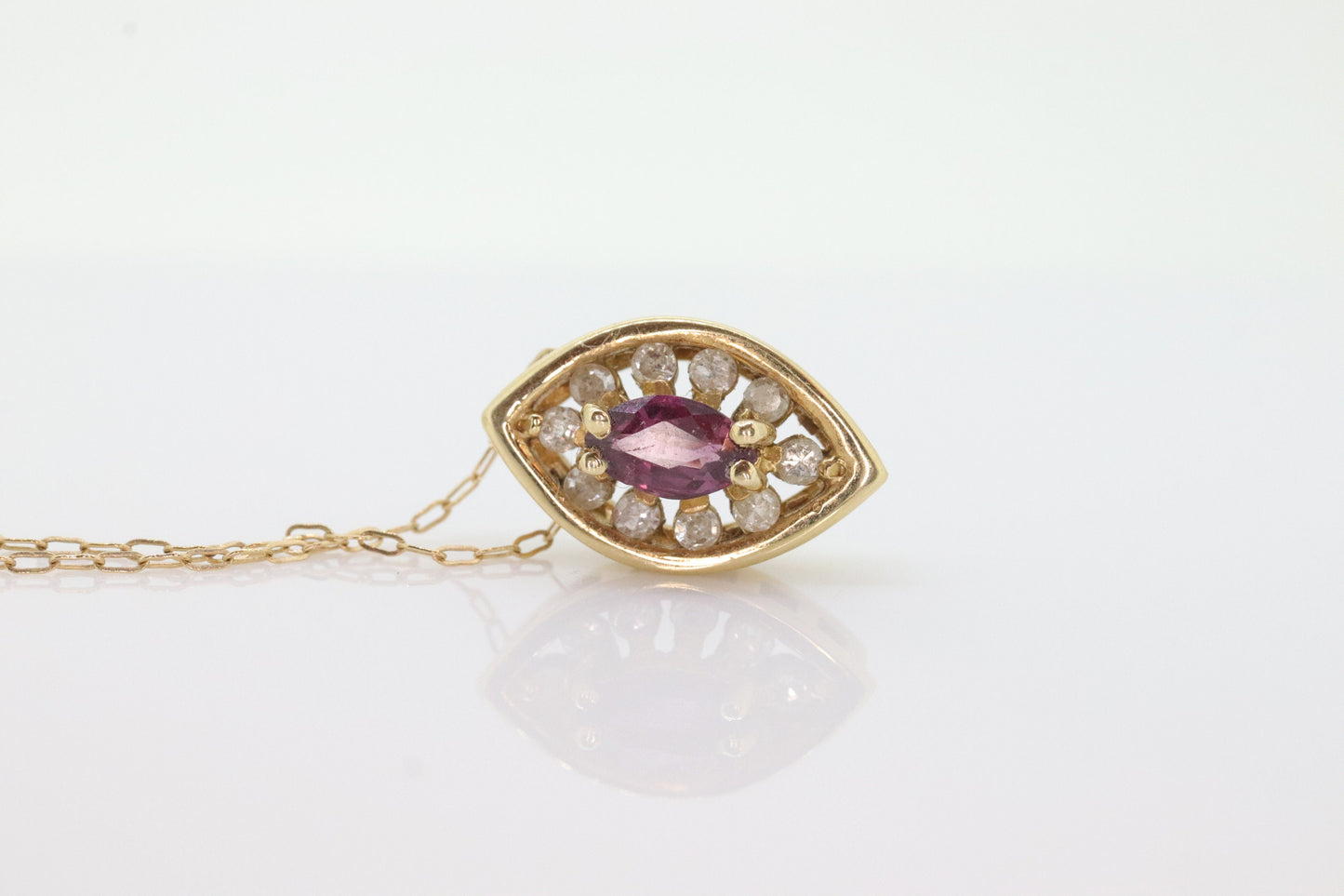 Ruby and diamond halo pendant. 14k precious marquise ruby pendant necklace. st(80/50)