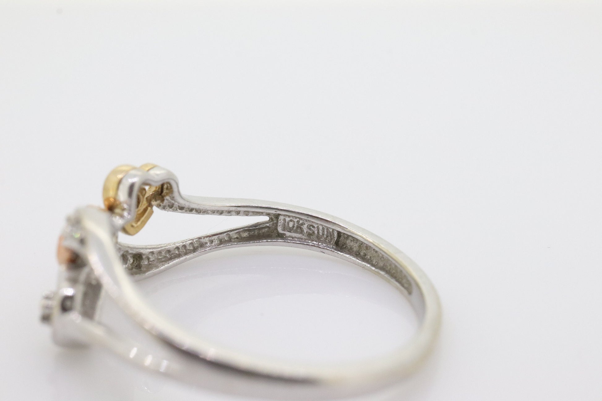 10k Triple Heart Diamond Cluster ring. 10k yellow gold with Rose gold middle heart white gold. st(46)