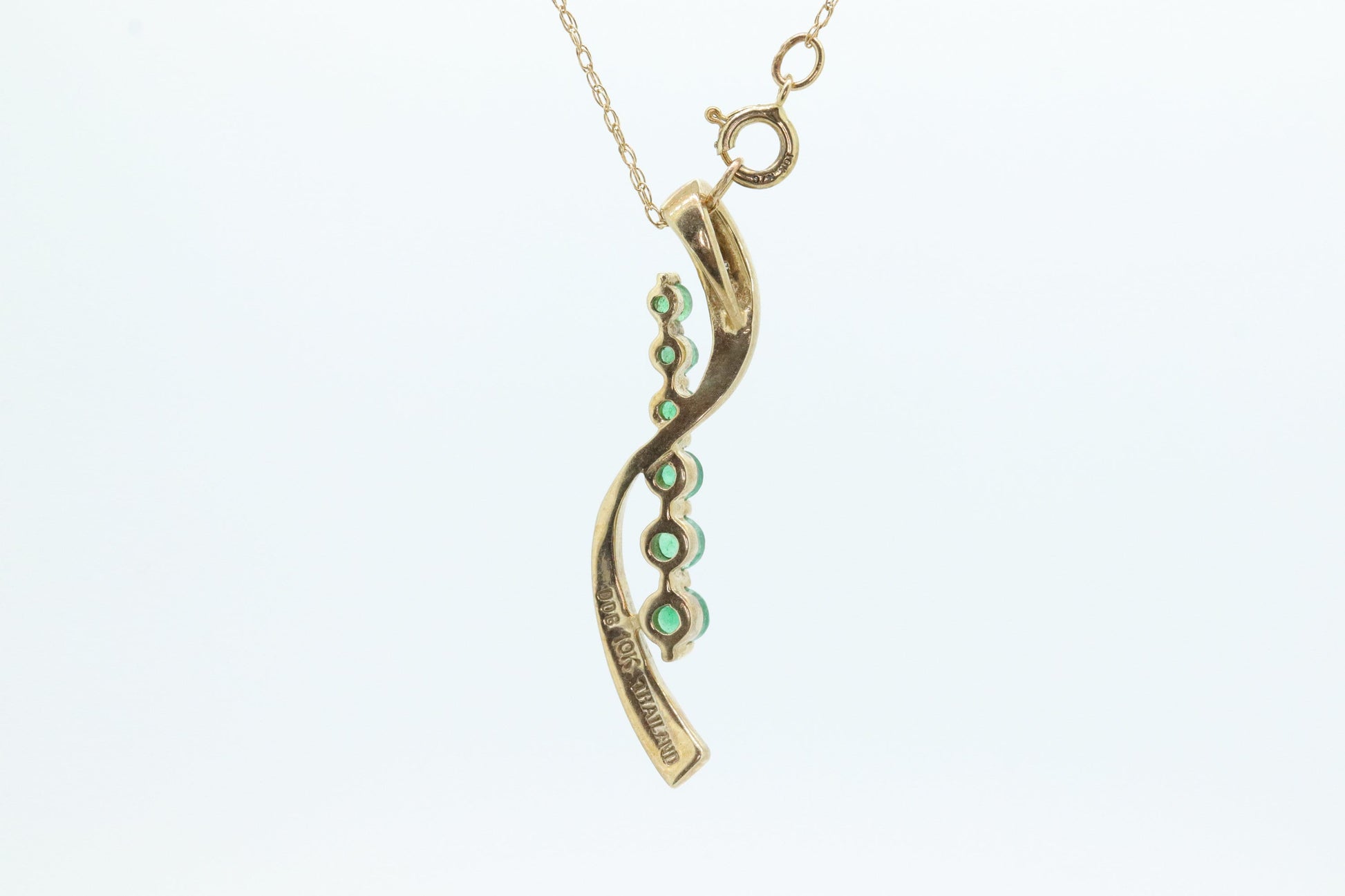 10k Gold 6 emerald Journey Pendant and necklace. Round Green Emerald Graduating Journey Pendant. St(75)