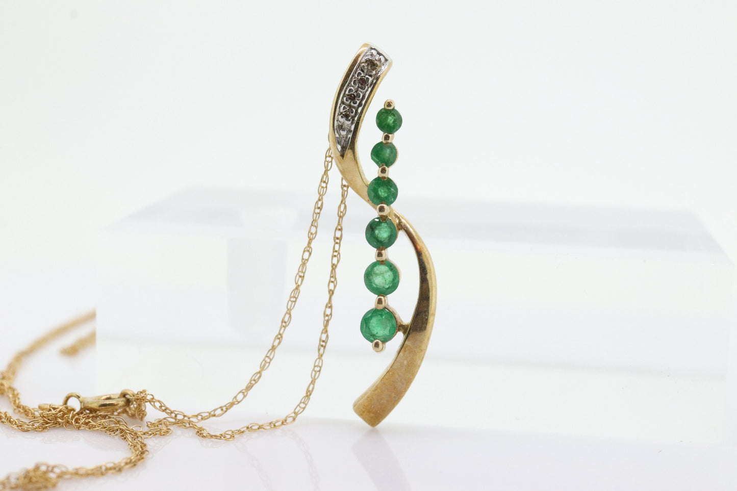 10k Gold 6 emerald Journey Pendant and necklace. Round Green Emerald Graduating Journey Pendant. St(75)