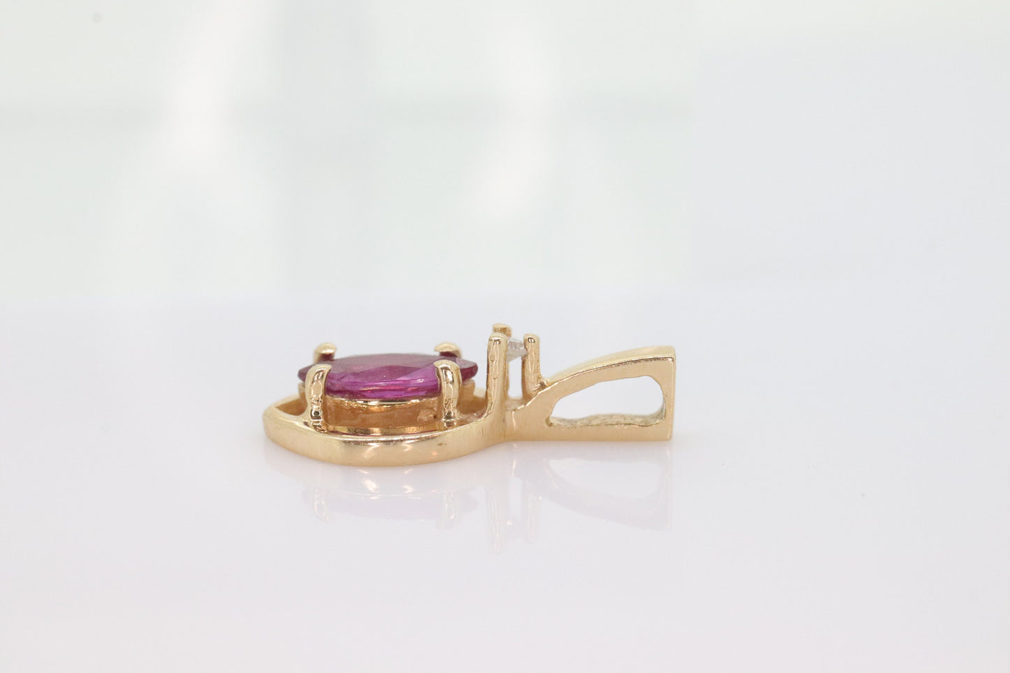 Ruby and diamond pendant. 14k precious marquise ruby pendant. st(25)