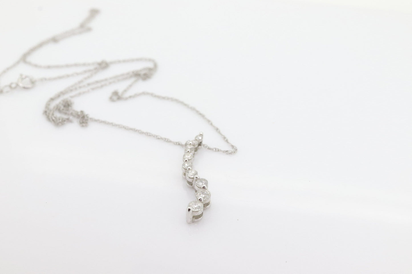 14k White Gold 9 diamond Journey Pendant and necklace. Love is a Journey Pendant. st(86)