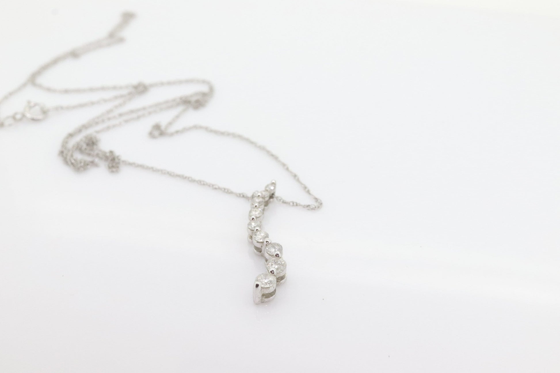 14k White Gold 9 diamond Journey Pendant and necklace. Love is a Journey Pendant. st(86)
