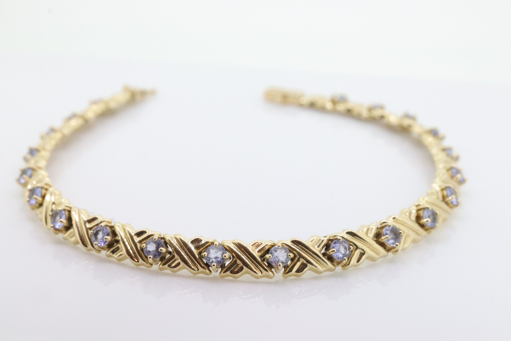 14k Tanzanite XOXO Bracelet. 14k Yellow Gold Kiss Hug Tanzanite Bracelet. 14k Tanzanite Tennis Bracelet. st(201)