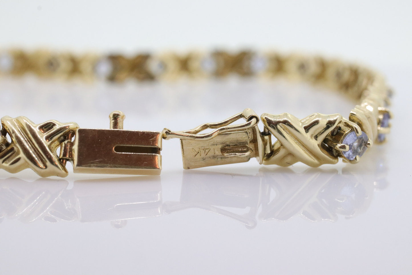 14k Tanzanite XOXO Bracelet. 14k Yellow Gold Kiss Hug Tanzanite Bracelet. 14k Tanzanite Tennis Bracelet. st(201)
