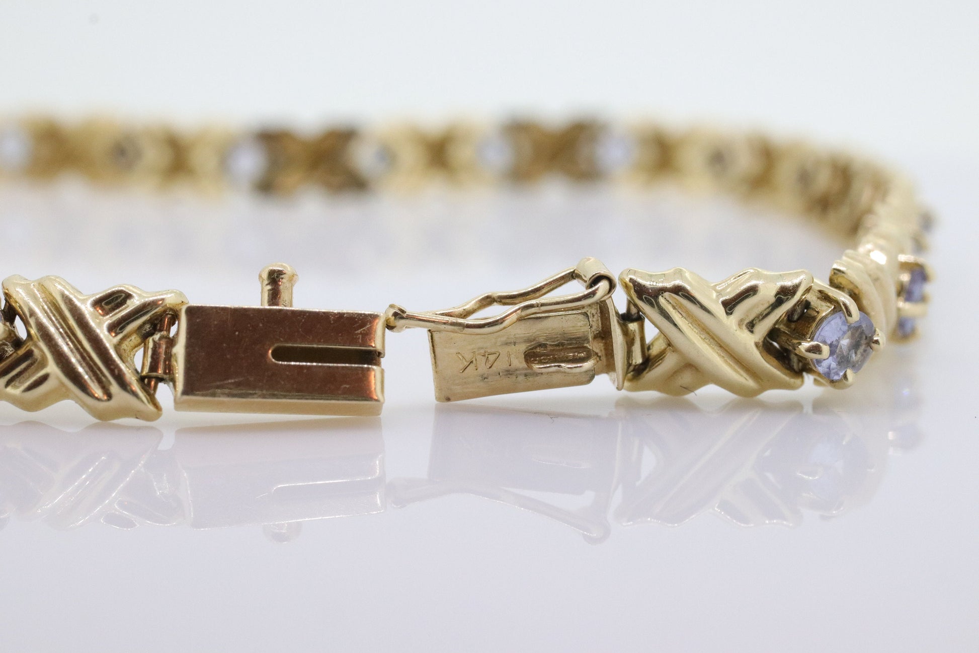 14k Tanzanite XOXO Bracelet. 14k Yellow Gold Kiss Hug Tanzanite Bracelet. 14k Tanzanite Tennis Bracelet. st(201)