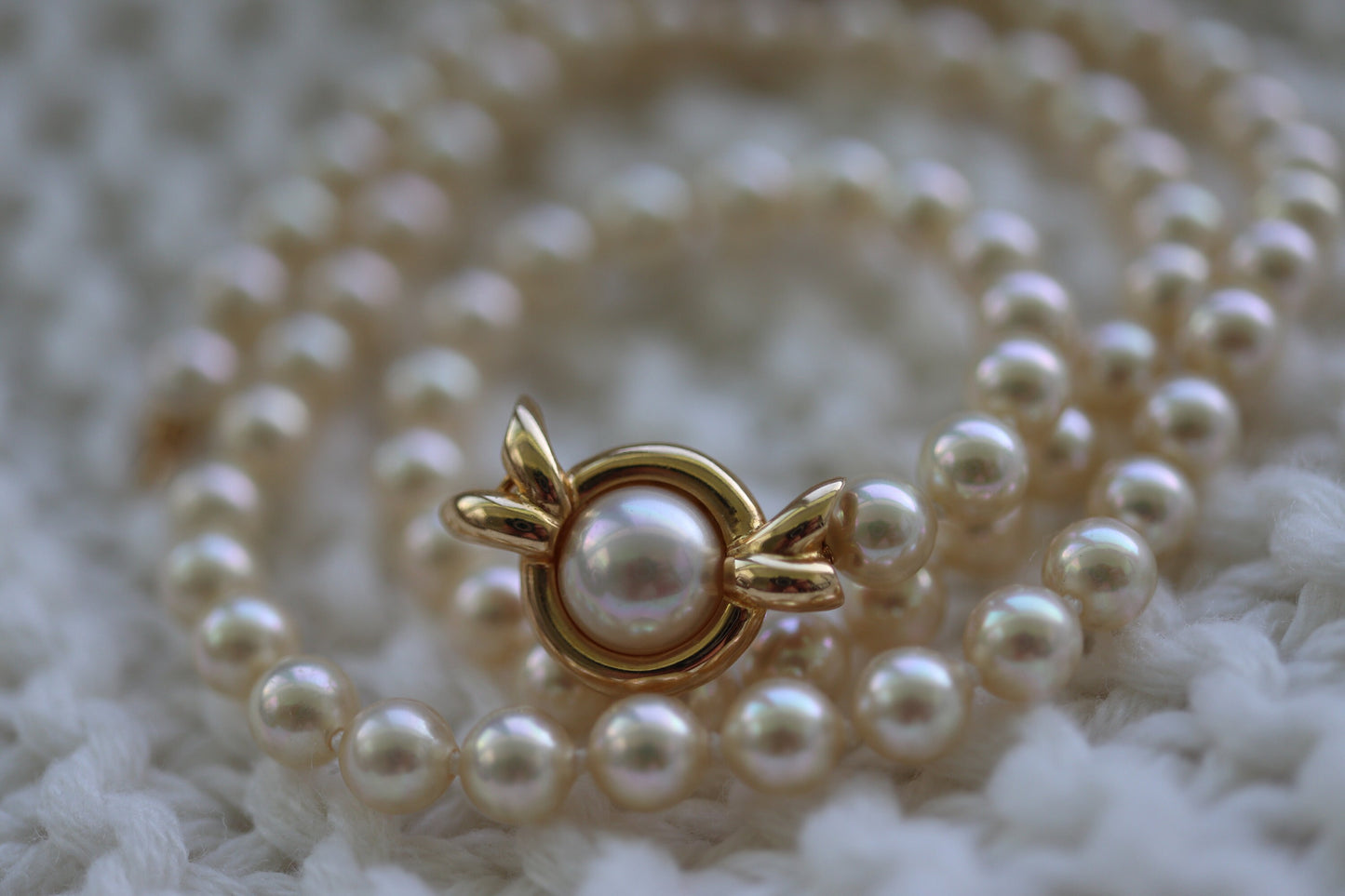 18k Akoya Pearl Necklace. High Quality Designer 18in length 5.5mm AKOYA pearls with warm hue. 18k PMS Designer Pearls necklace. st(115)