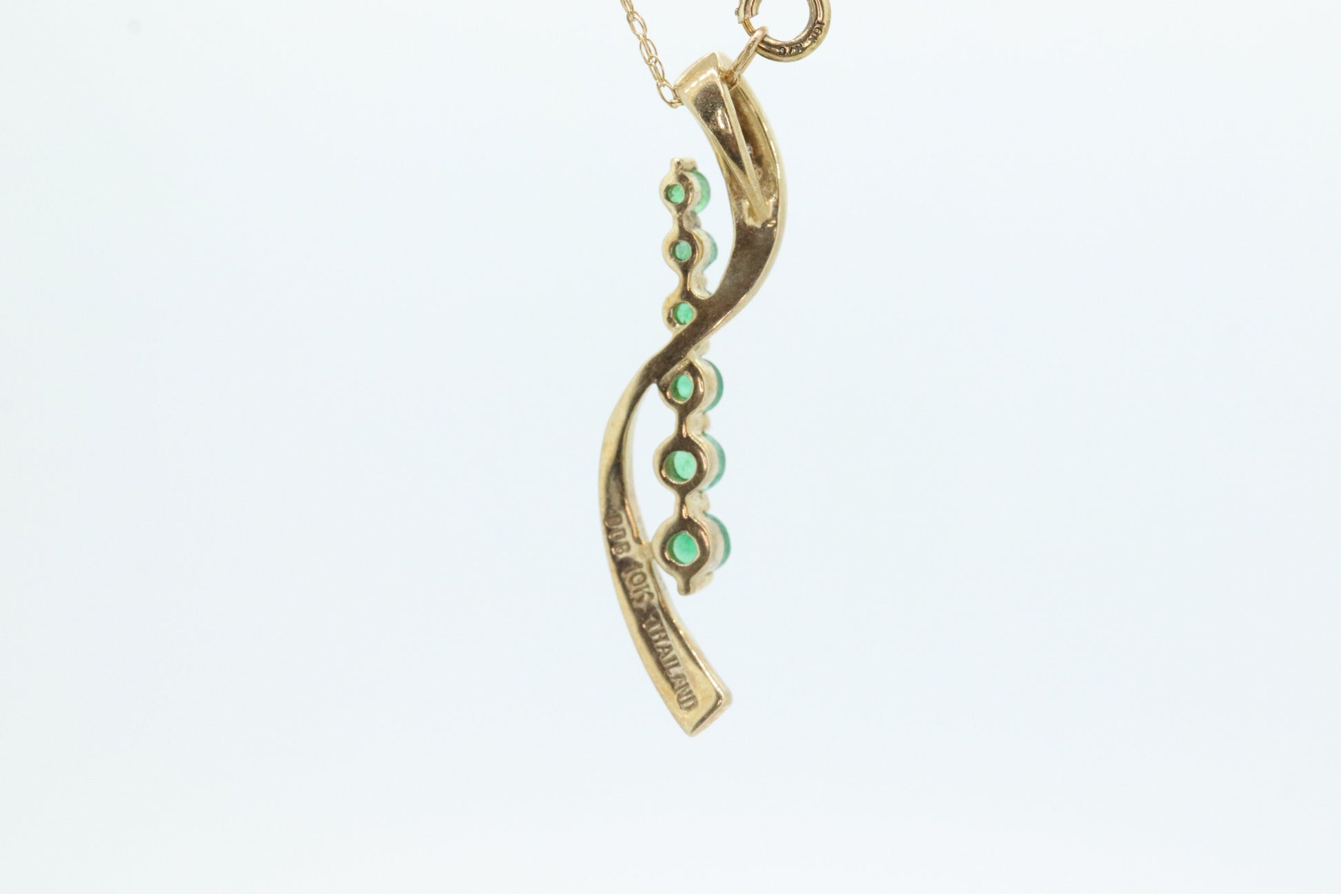 10k Gold 6 emerald Journey Pendant and necklace. Round Green Emerald Graduating Journey Pendant. St(75)