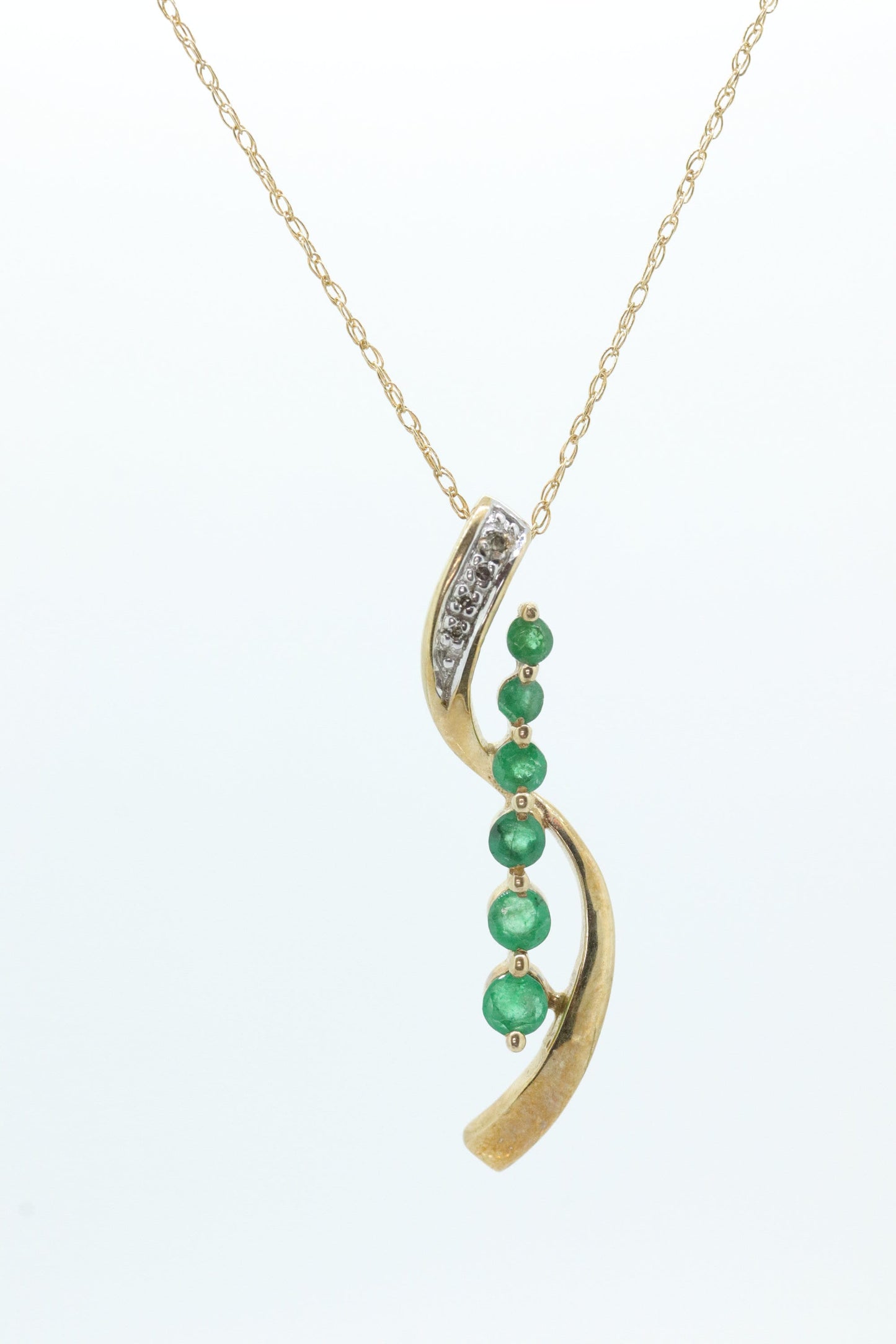 10k Gold 6 emerald Journey Pendant and necklace. Round Green Emerald Graduating Journey Pendant. St(75)