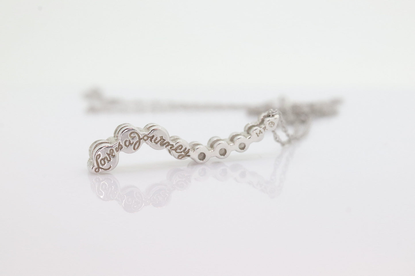 14k White Gold 9 diamond Journey Pendant and necklace. Love is a Journey Pendant. st(86)