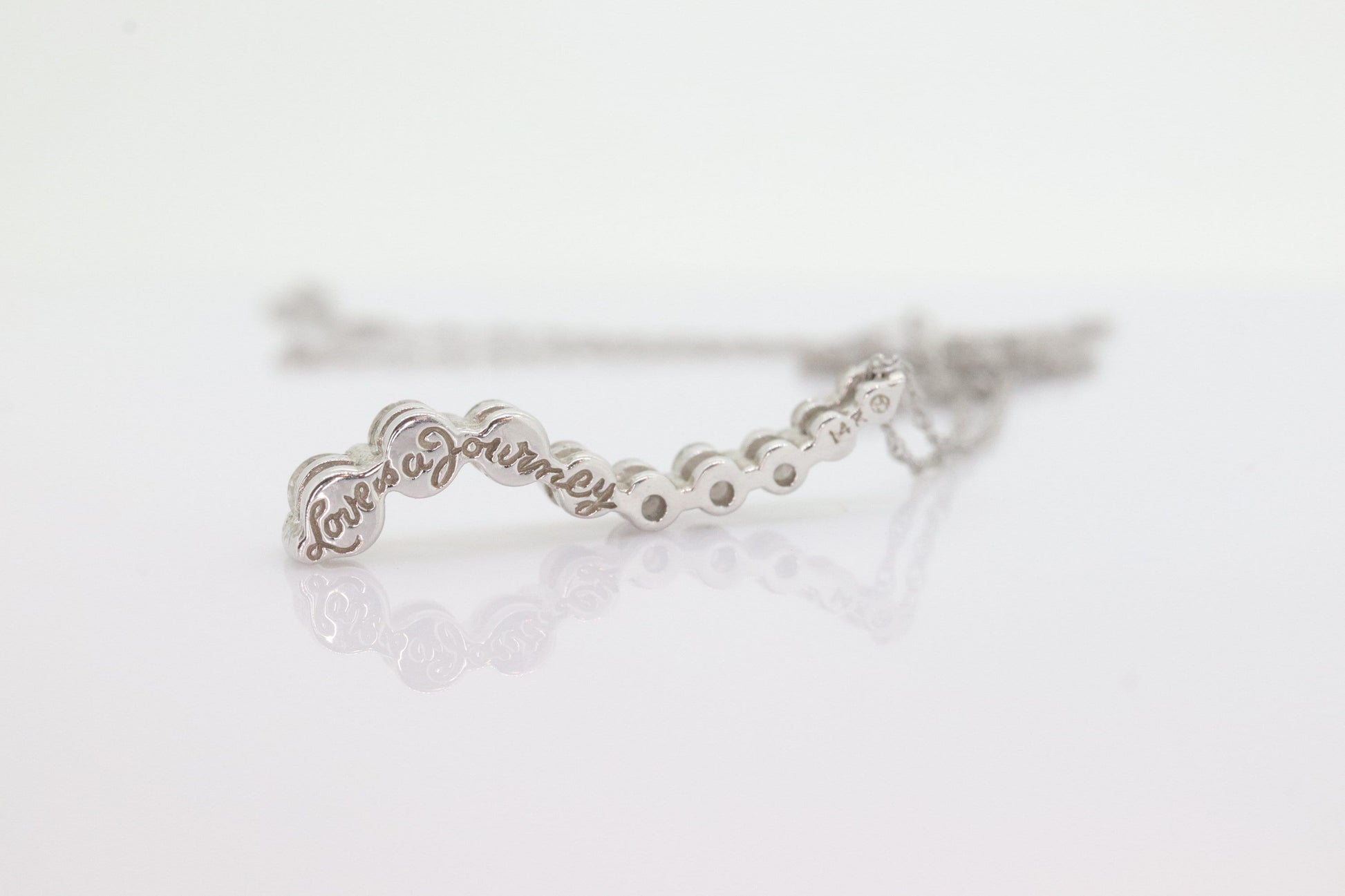 14k White Gold 9 diamond Journey Pendant and necklace. Love is a Journey Pendant. st(86)