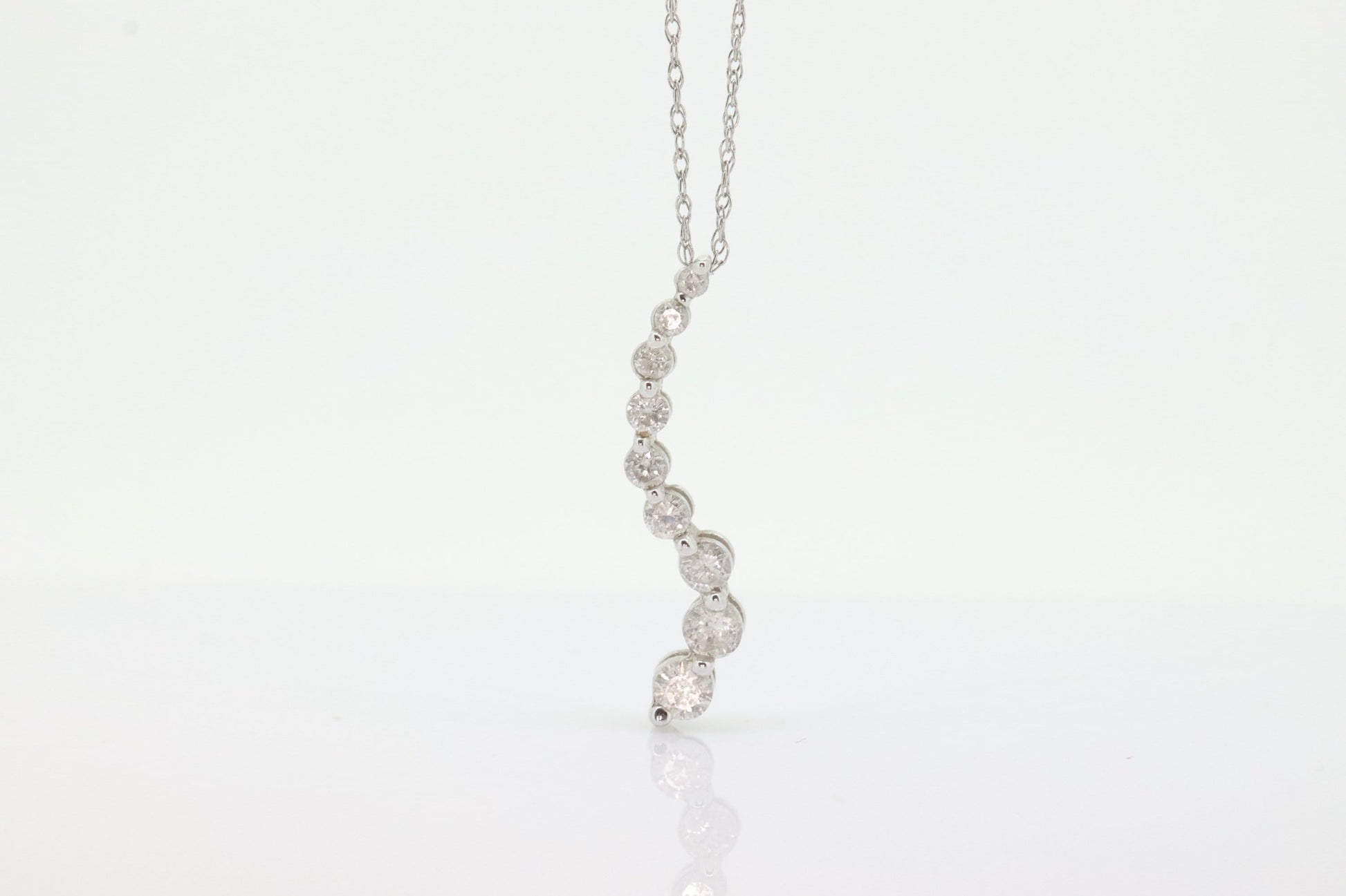 14k White Gold 9 diamond Journey Pendant and necklace. Love is a Journey Pendant. st(86)