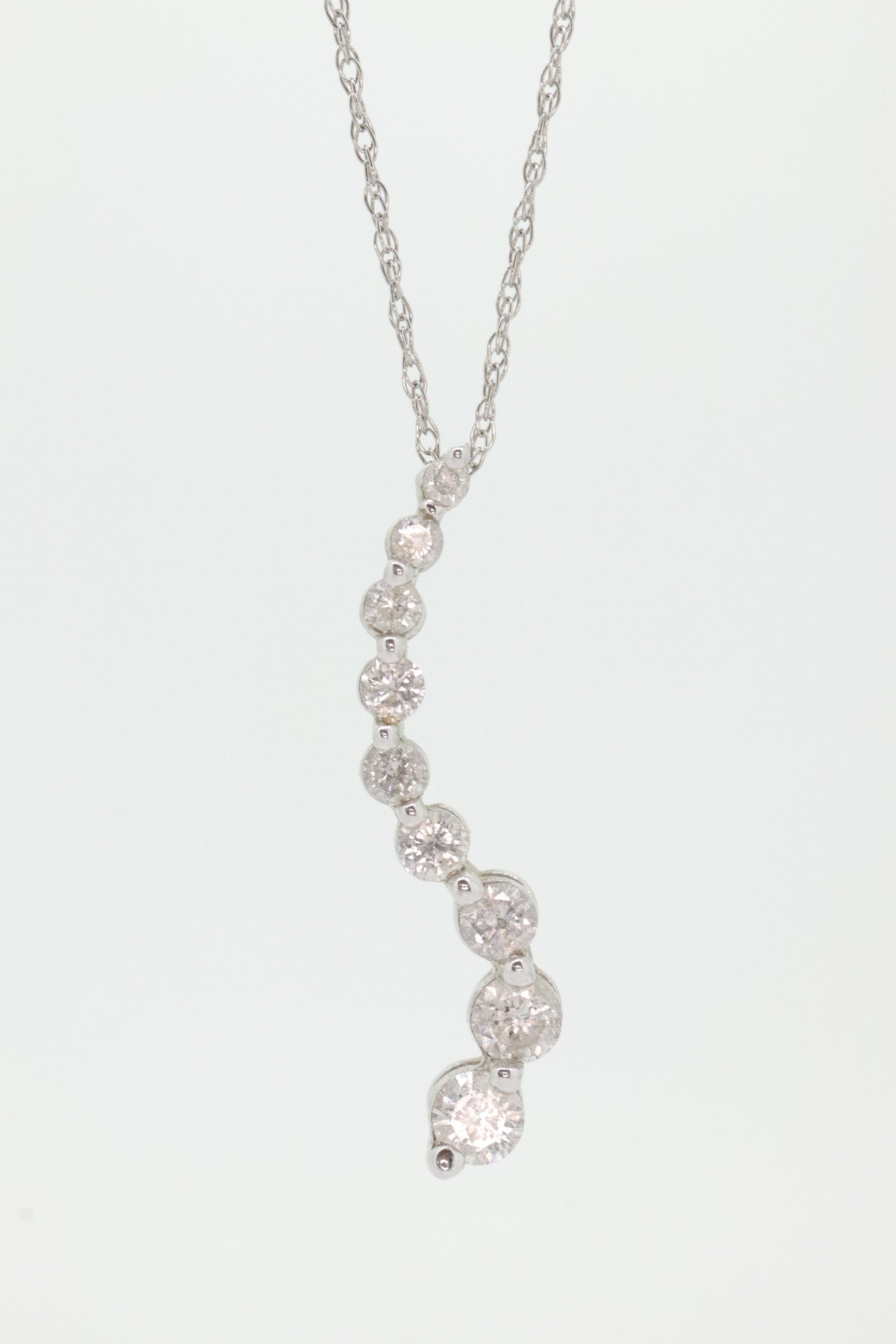 14k White Gold 9 diamond Journey Pendant and necklace. Love is a Journey Pendant. st(86)