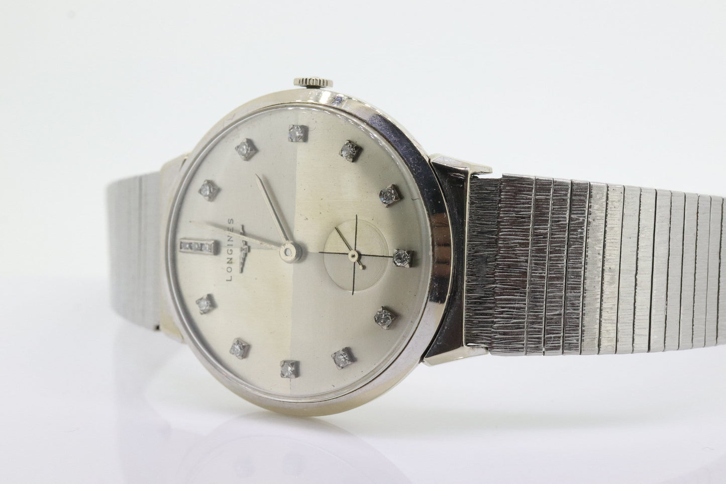 LONGINES WATCH. 14k Longines Diamond Mens Watch with 14 diamond Face. Likely a 22L movement, 1950s RAJAH