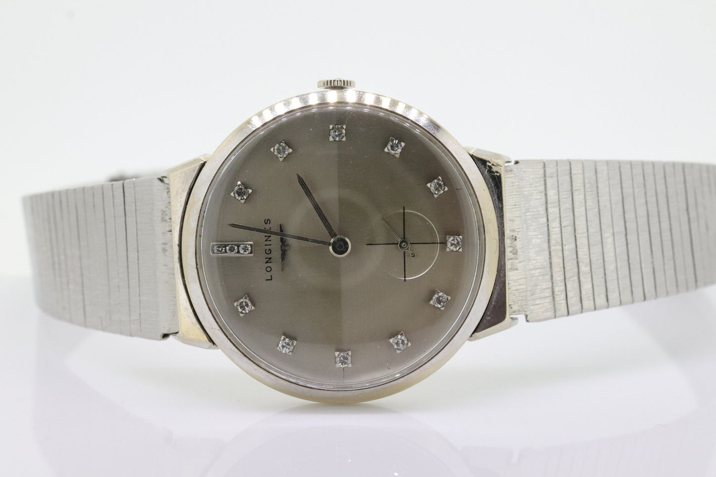 LONGINES WATCH. 14k Longines Diamond Mens Watch with 14 diamond Face. Likely a 22L movement, 1950s RAJAH