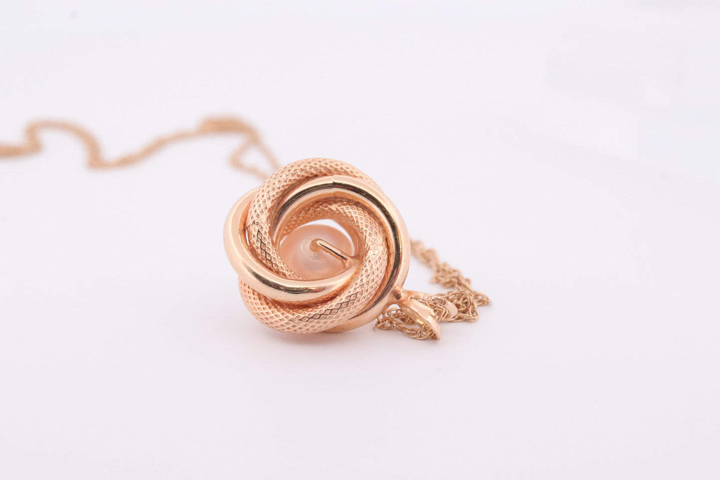 14k Pearl Rope coil Necklace. Pearl Love Knot Pendant Necklace.