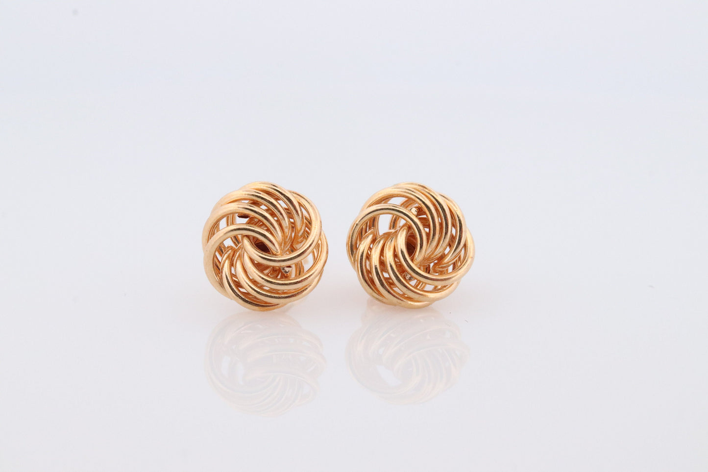 18k LOVE knot stud earring. 18k Yellow Gold Coil KNOT gold studs earrings. Italy Circle Coil studs.