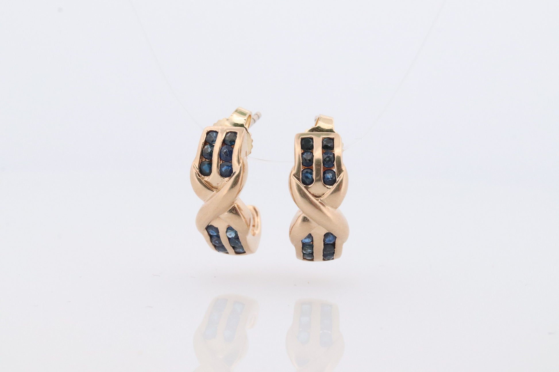 14k Sapphire cross X Dangle earrings. Criss X Channel set Sapphire hoop earrings. XOXO Love Kiss Hug Blue Sapphire Earrings.