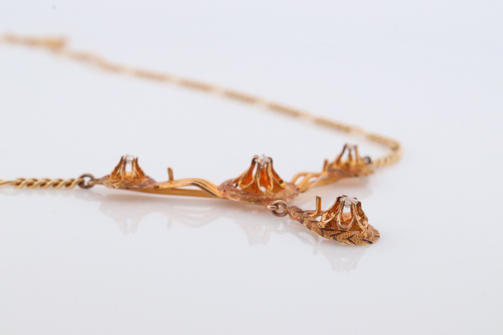 Diamond pendant lavaliere. 14k Gold with a diamond set buttercup necklace. Figaro Chain necklace. Balestra