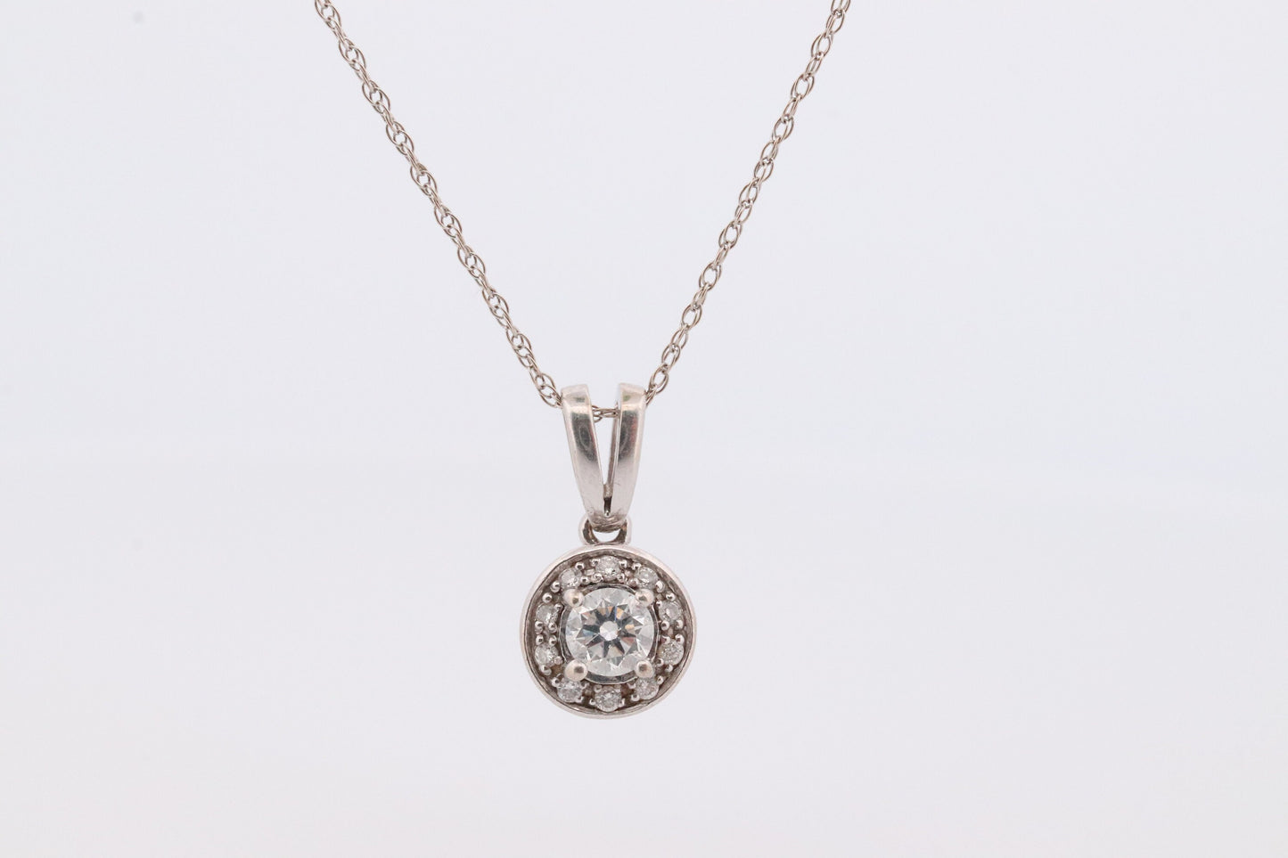 14k Diamond Solitaire Halo Pendant. 14k White gold and 24K Yellow Gold Inlay Canister Pendant. Singapore chain necklace.