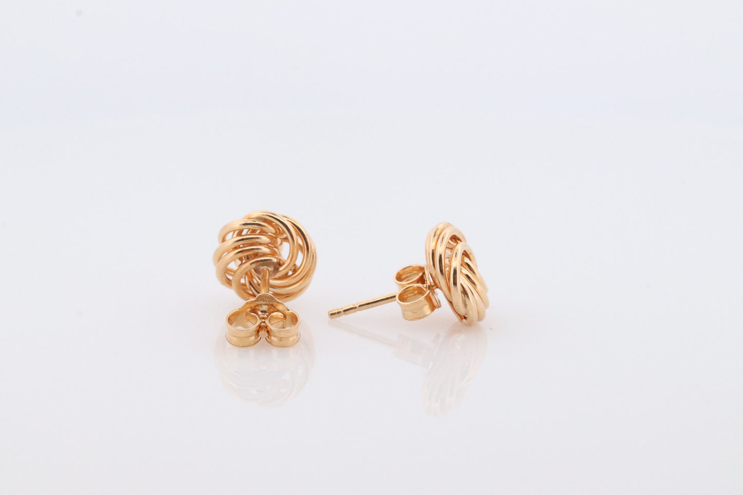 18k LOVE knot stud earring. 18k Yellow Gold Coil KNOT gold studs earrings. Italy Circle Coil studs.