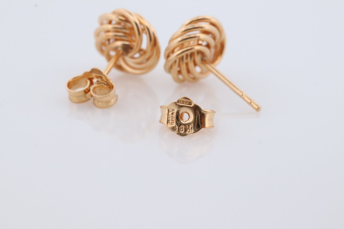 18k LOVE knot stud earring. 18k Yellow Gold Coil KNOT gold studs earrings. Italy Circle Coil studs.