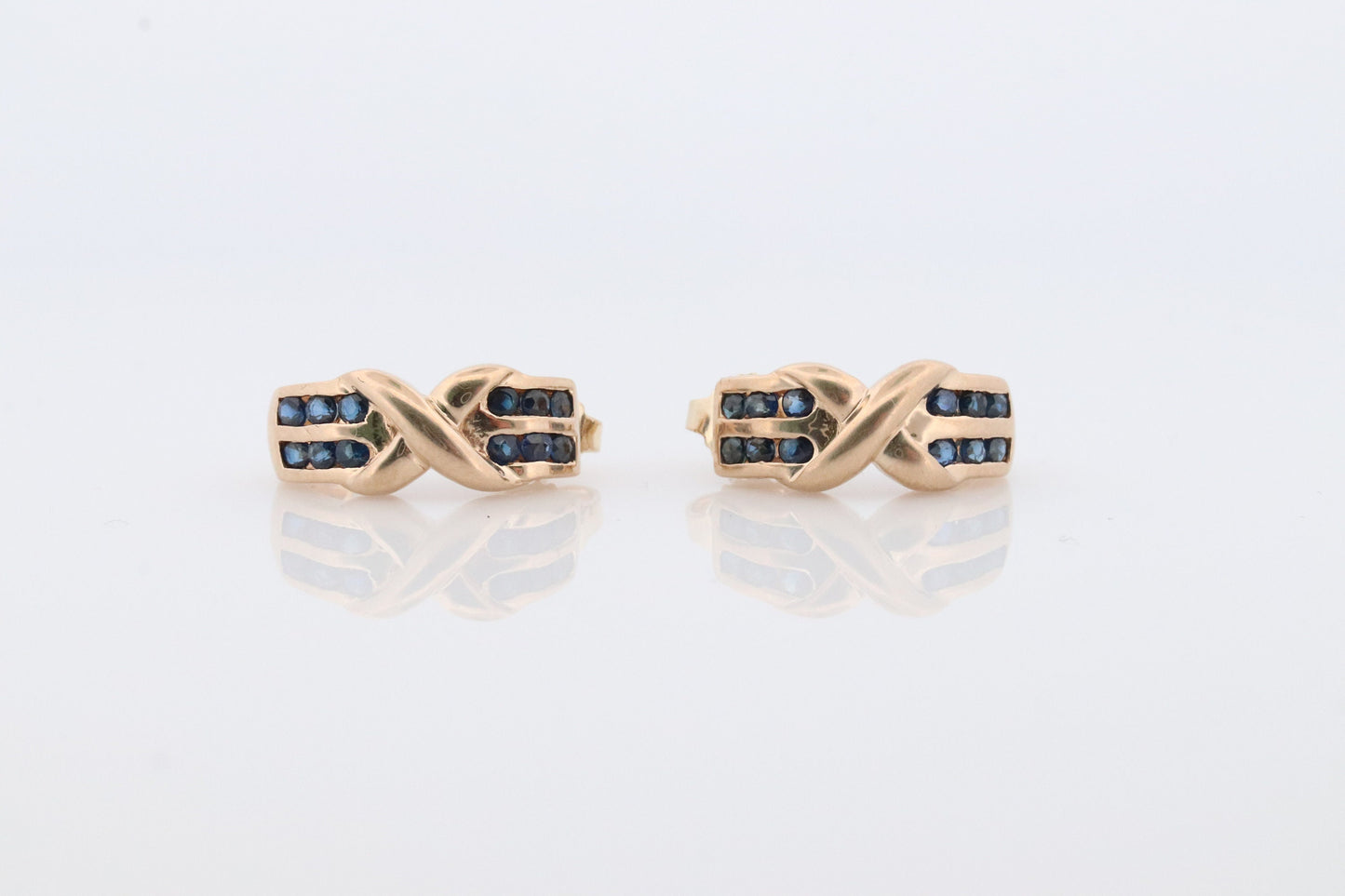 14k Sapphire cross X Dangle earrings. Criss X Channel set Sapphire hoop earrings. XOXO Love Kiss Hug Blue Sapphire Earrings.