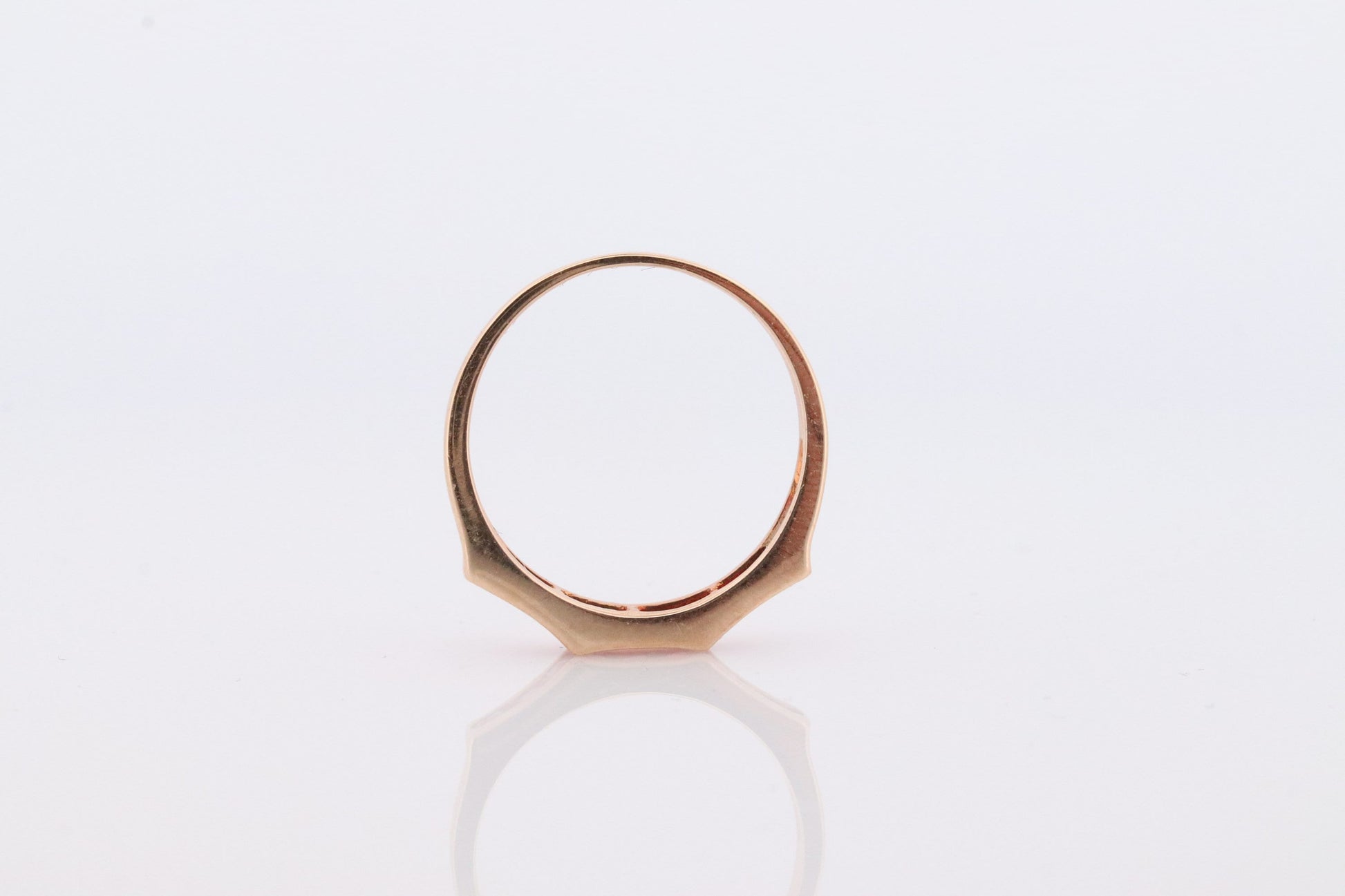 14k Eternity Half Ruby Ring. A 14k gold ring with round Ruby half eternity anniversary band.