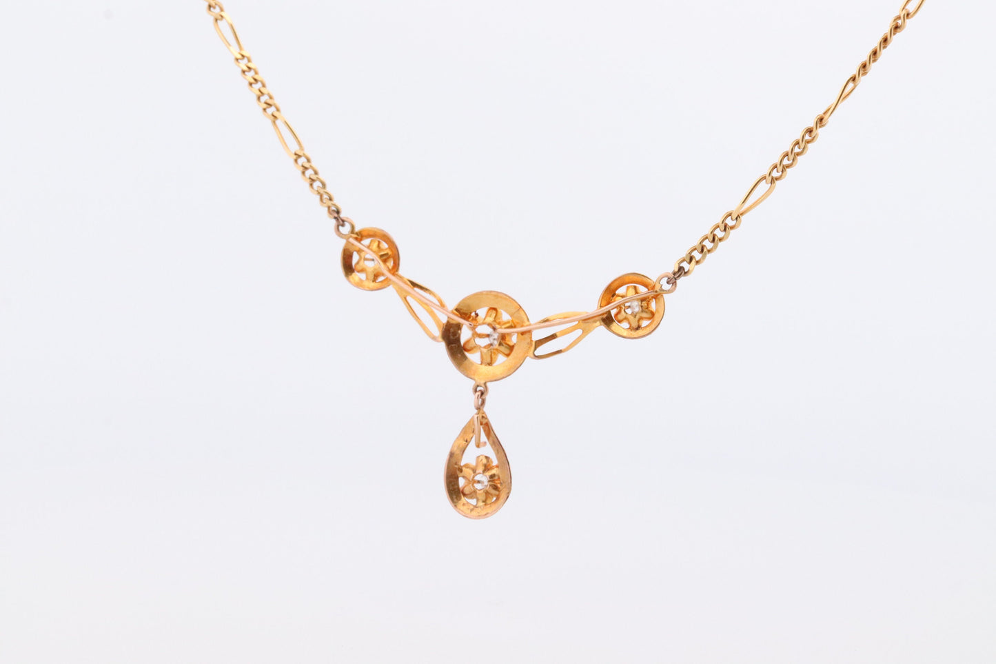 Diamond pendant lavaliere. 14k Gold with a diamond set buttercup necklace. Figaro Chain necklace. Balestra