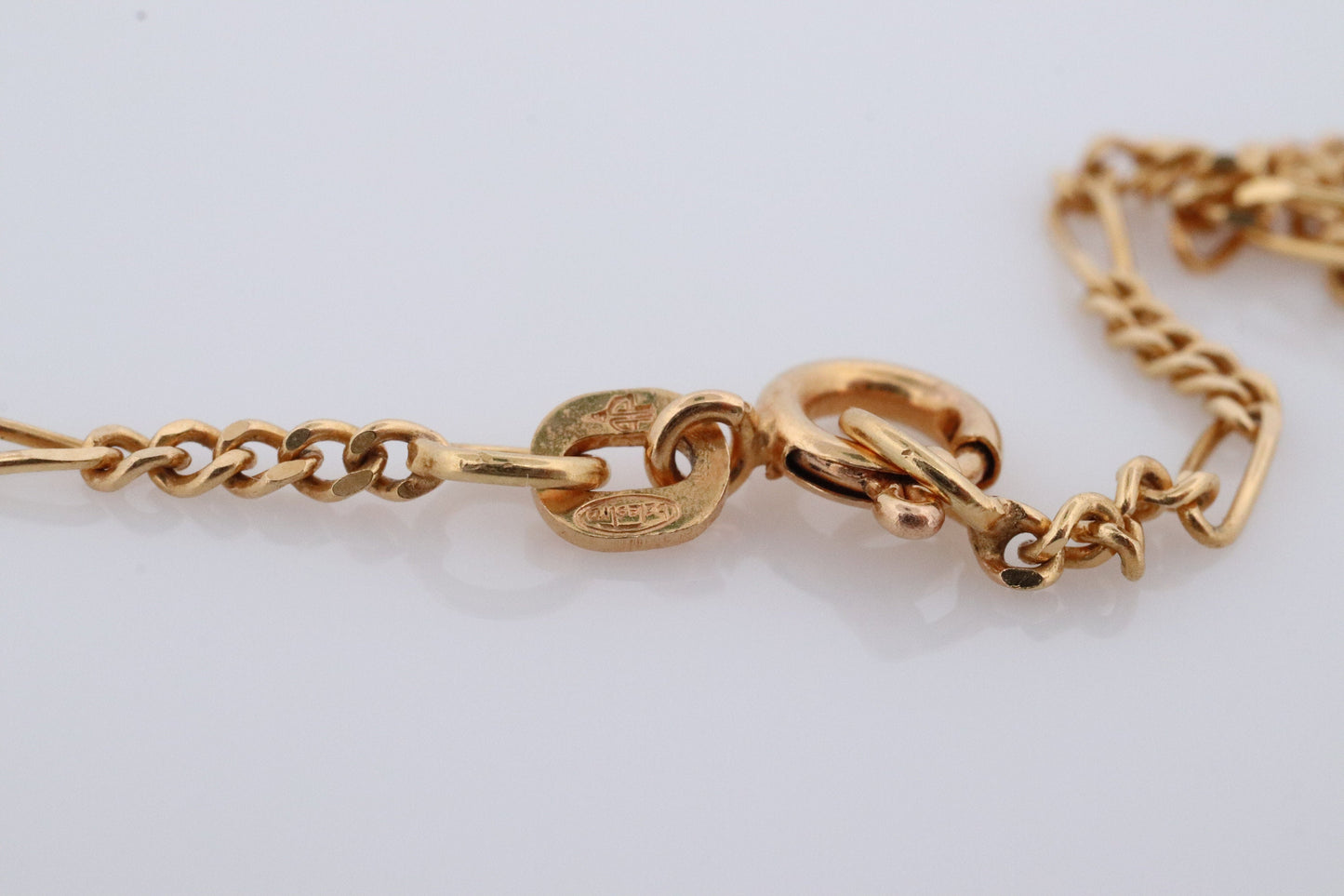 Diamond pendant lavaliere. 14k Gold with a diamond set buttercup necklace. Figaro Chain necklace. Balestra