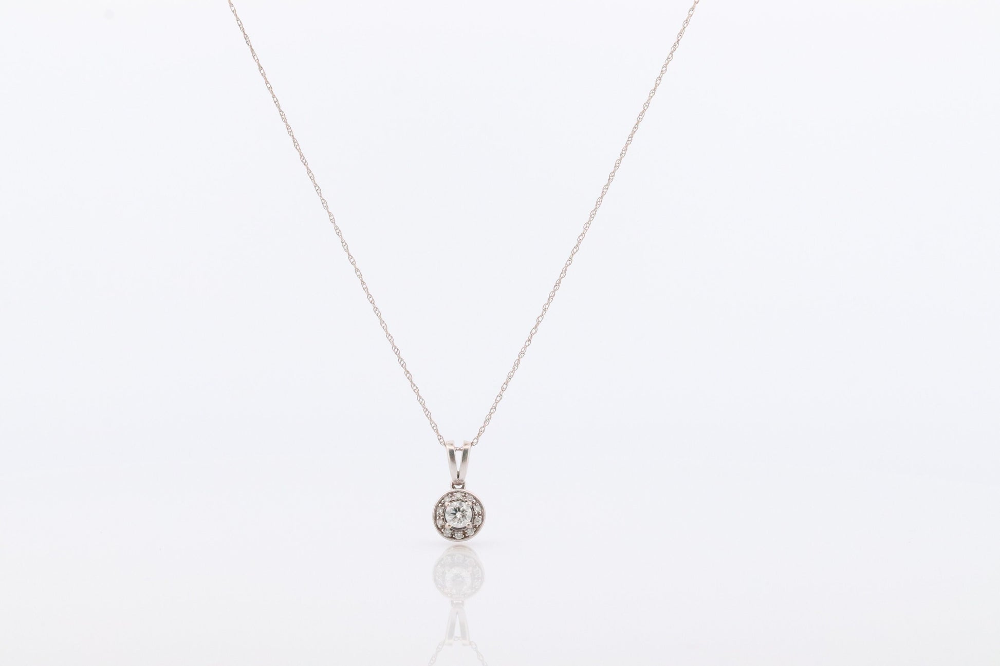 14k Diamond Solitaire Halo Pendant. 14k White gold and 24K Yellow Gold Inlay Canister Pendant. Singapore chain necklace.