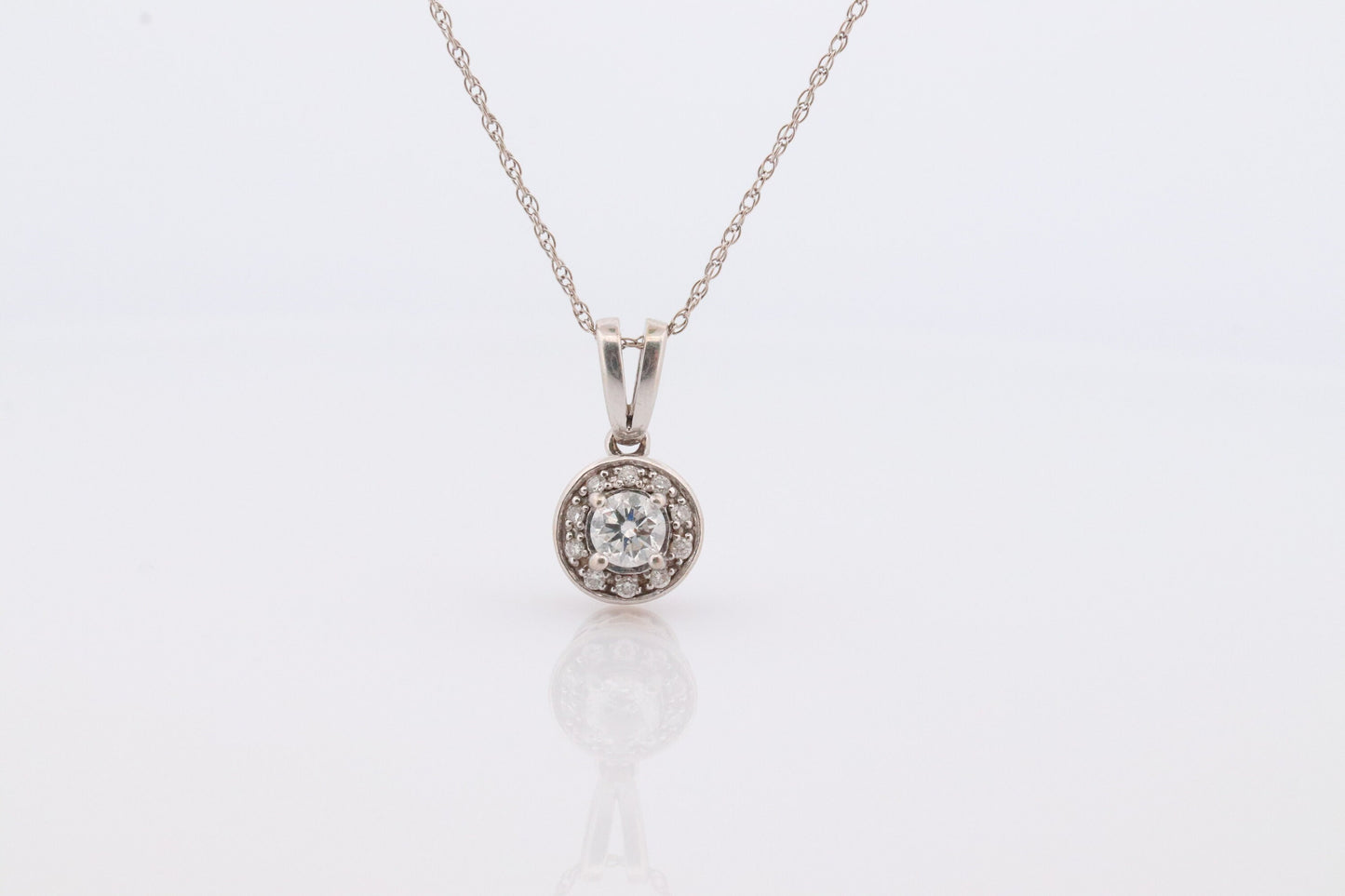 14k Diamond Solitaire Halo Pendant. 14k White gold and 24K Yellow Gold Inlay Canister Pendant. Singapore chain necklace.