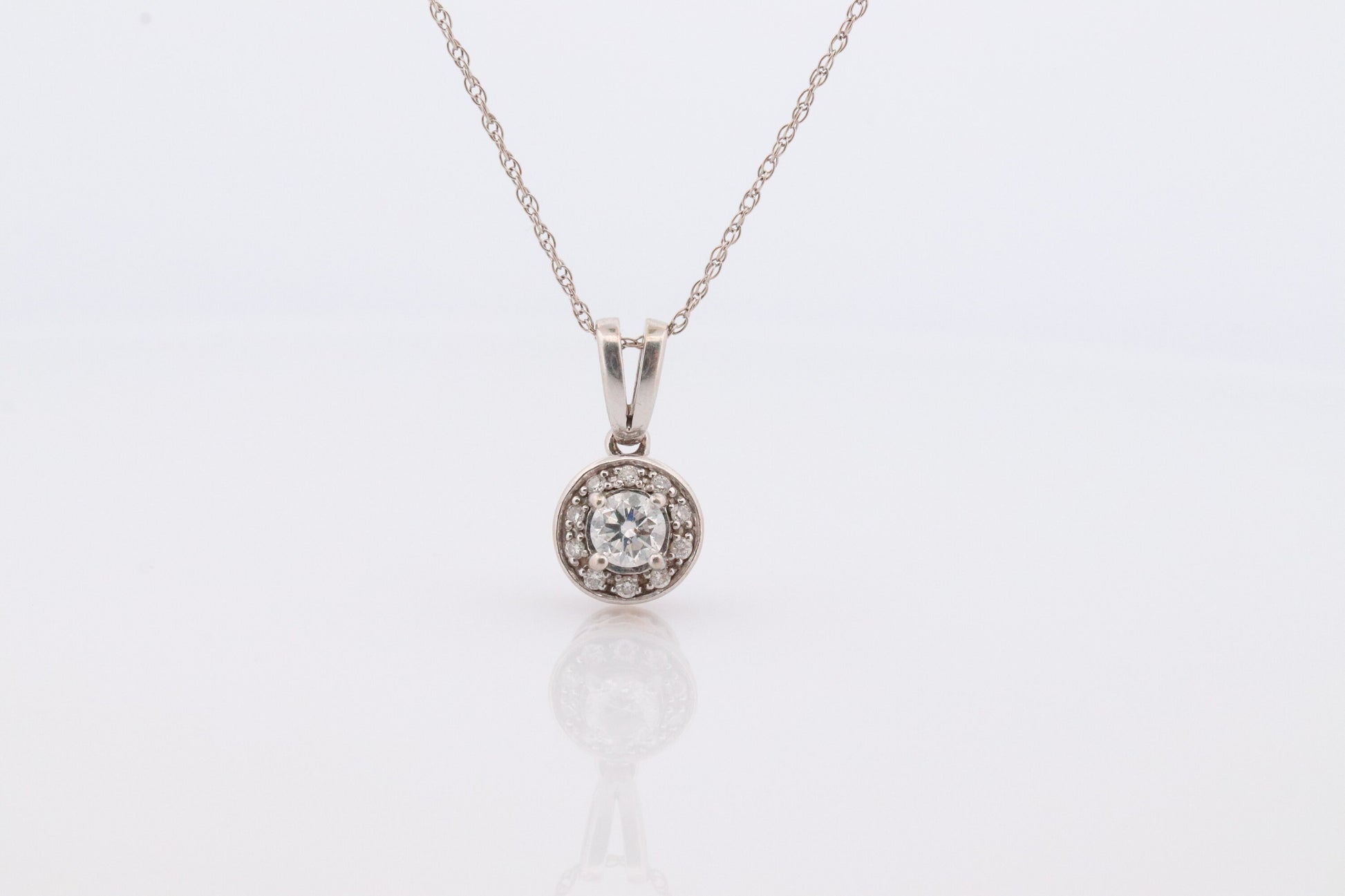14k Diamond Solitaire Halo Pendant. 14k White gold and 24K Yellow Gold Inlay Canister Pendant. Singapore chain necklace.