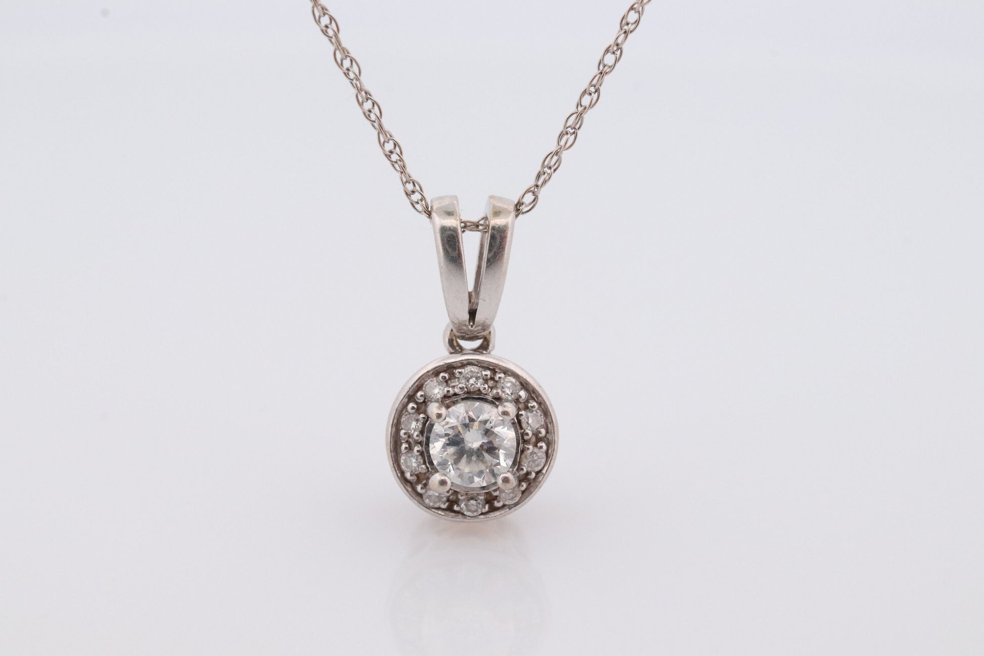 14k Diamond Solitaire Halo Pendant. 14k White gold and 24K Yellow Gold Inlay Canister Pendant. Singapore chain necklace.
