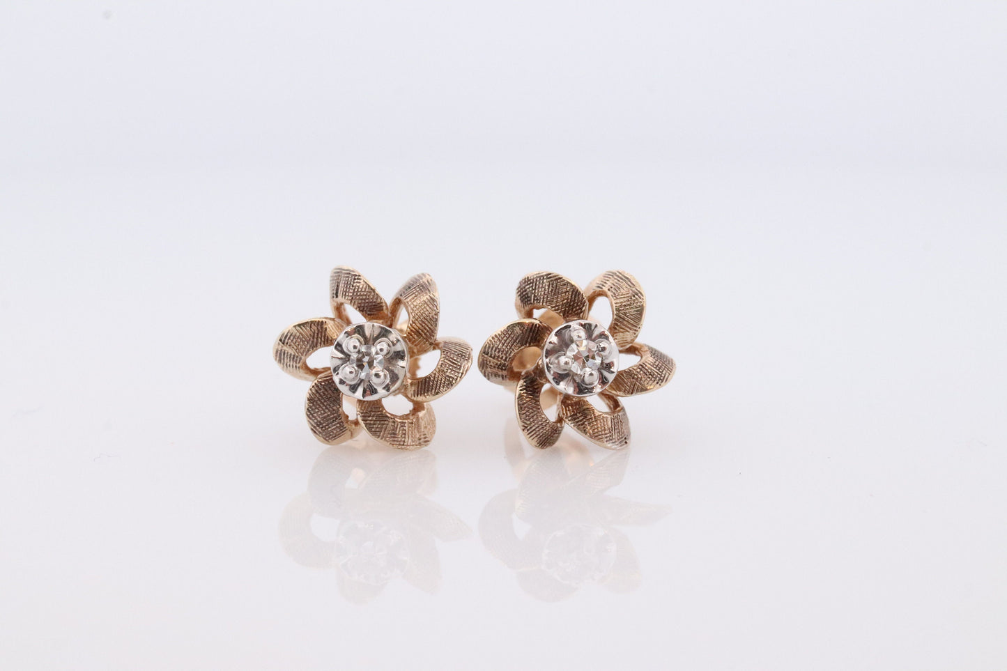 10k Diamond Flower or Star stud earrings. Flower Diamond Solitaire earrings. Propeller Flower Studs.