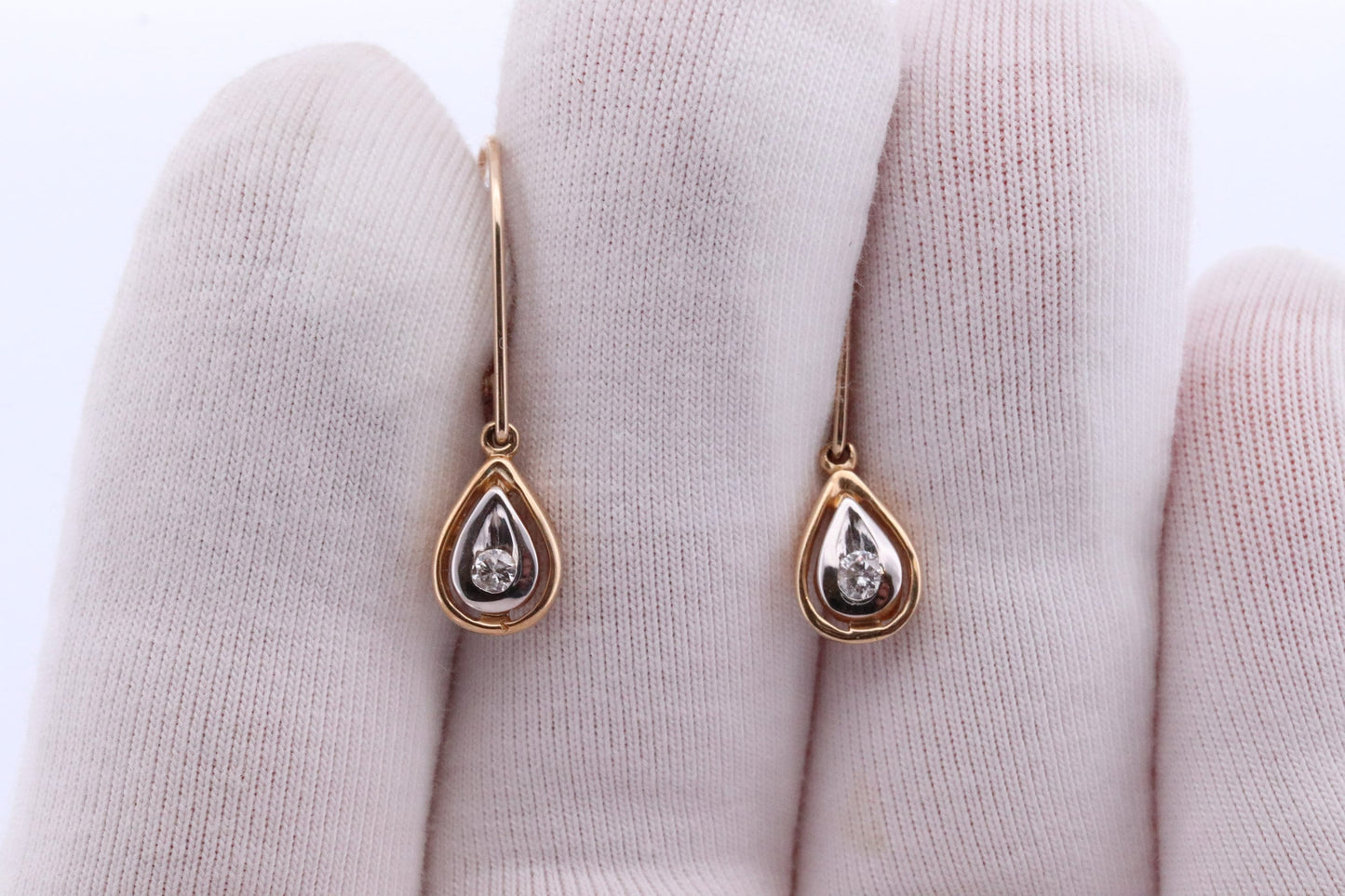10k Diamond Dangle Earrings. Diamond Drop Teardrop Diamond Dangle earrings. Yellow and White Gold bezel set diamond.