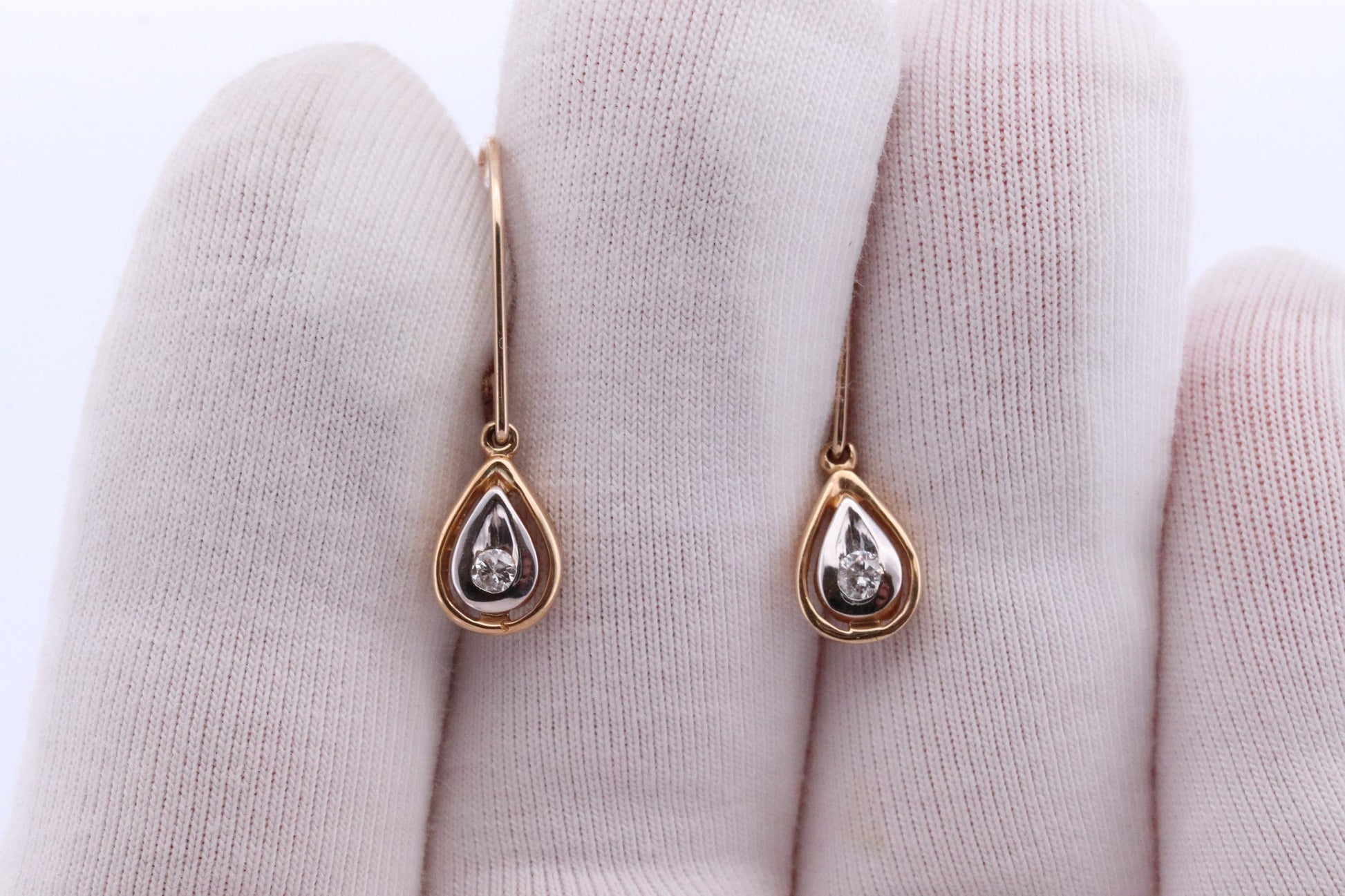 10k Diamond Dangle Earrings. Diamond Drop Teardrop Diamond Dangle earrings. Yellow and White Gold bezel set diamond.