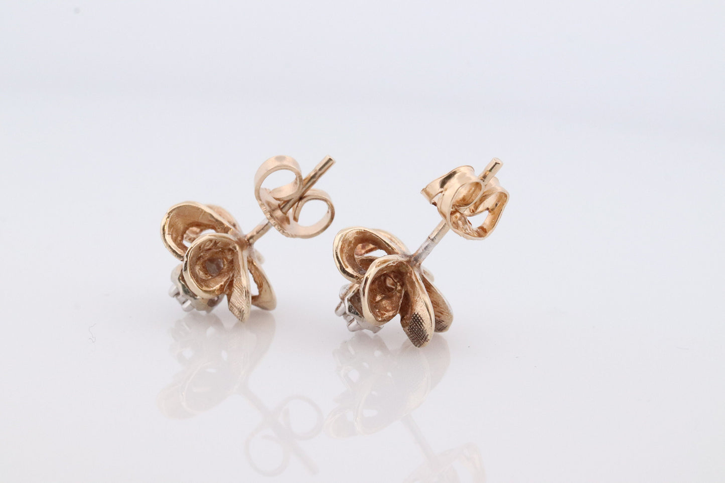 10k Diamond Flower or Star stud earrings. Flower Diamond Solitaire earrings. Propeller Flower Studs.