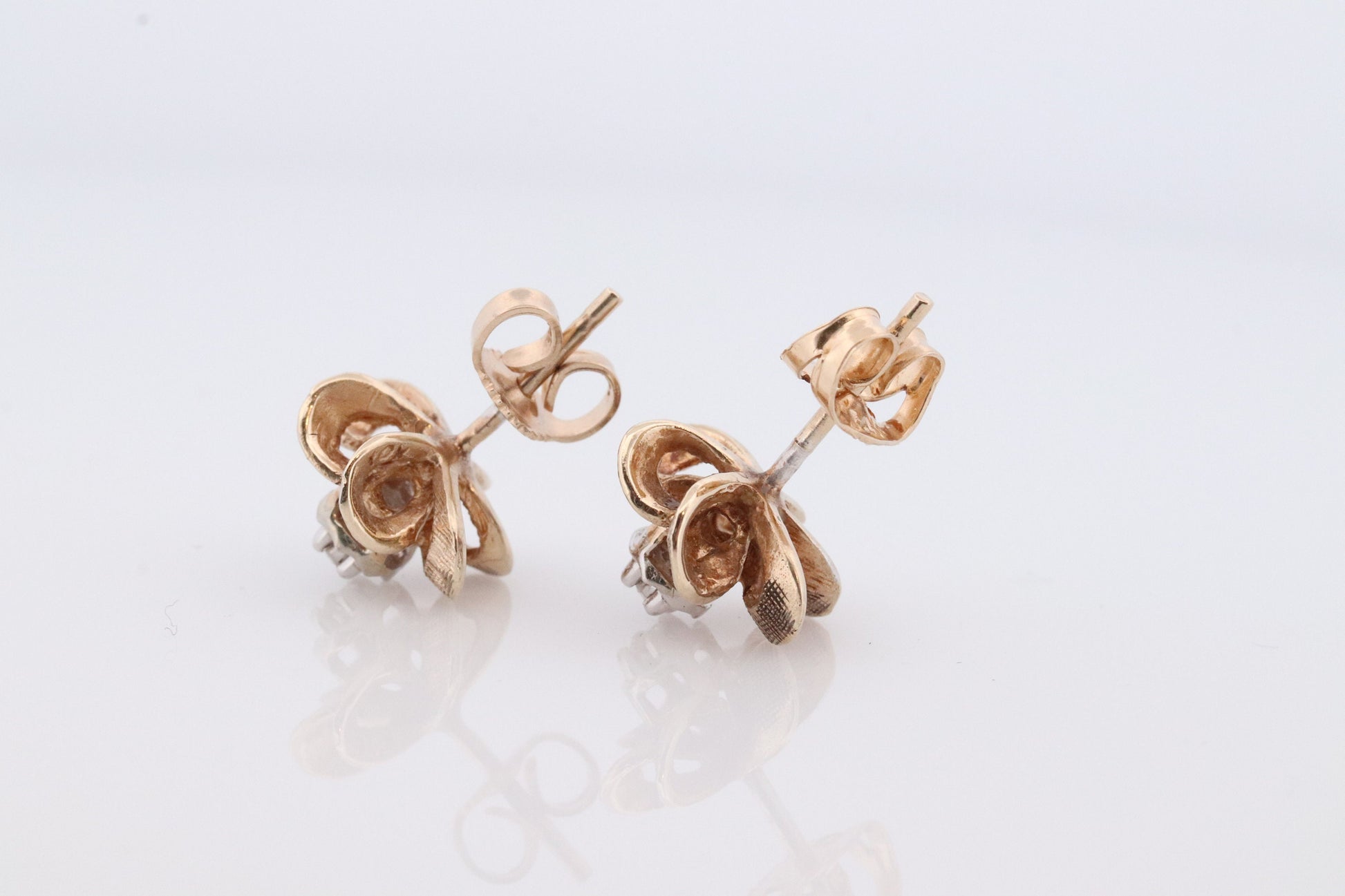 10k Diamond Flower or Star stud earrings. Flower Diamond Solitaire earrings. Propeller Flower Studs.