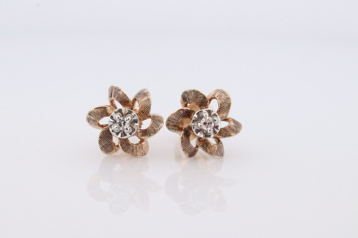 10k Diamond Flower or Star stud earrings. Flower Diamond Solitaire earrings. Propeller Flower Studs.